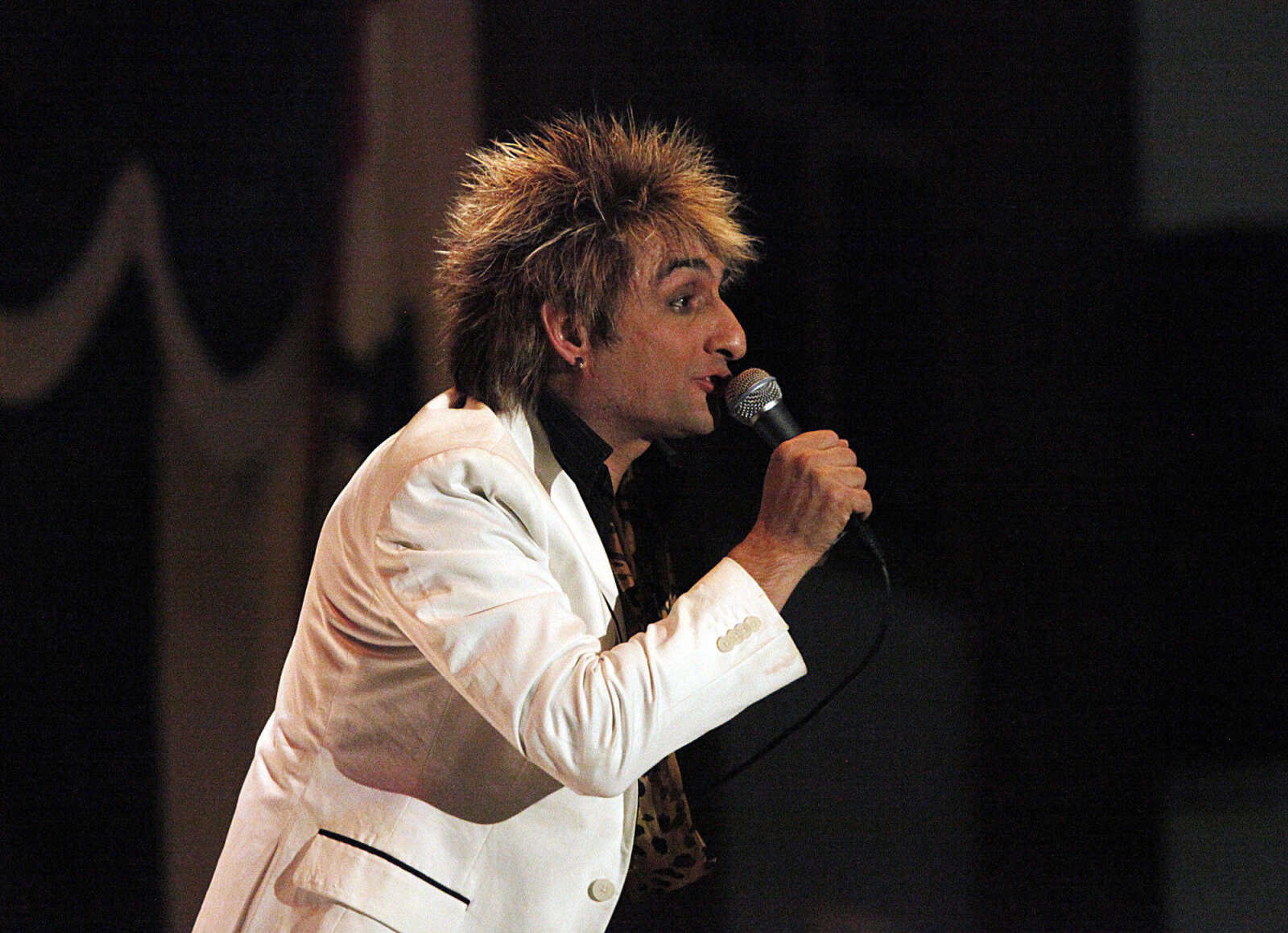 CHRIS MACKLER ~ photos@semissourian.com

Vic Vega performs as Rod Stewart during the Kiss, AC/DC and Rod Stewart Tribute Concert held at the Arena Building on Saturday, Nov. 6, 2010, in Cape Girardeau.