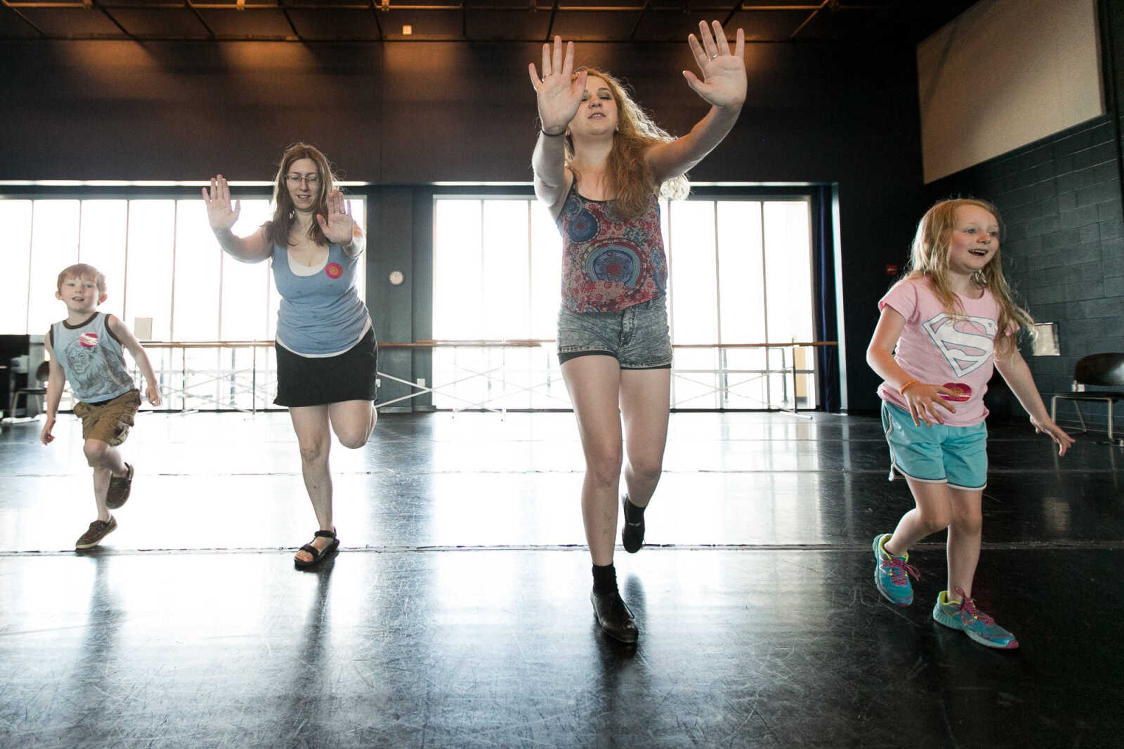 GLENN LANDBERG ~ glandberg@semissourian.com

Hannah Matheny, center, leads a group during a tap dance basics class Saturday, June 18, 2016 at the River Campus Summer Arts Festival.