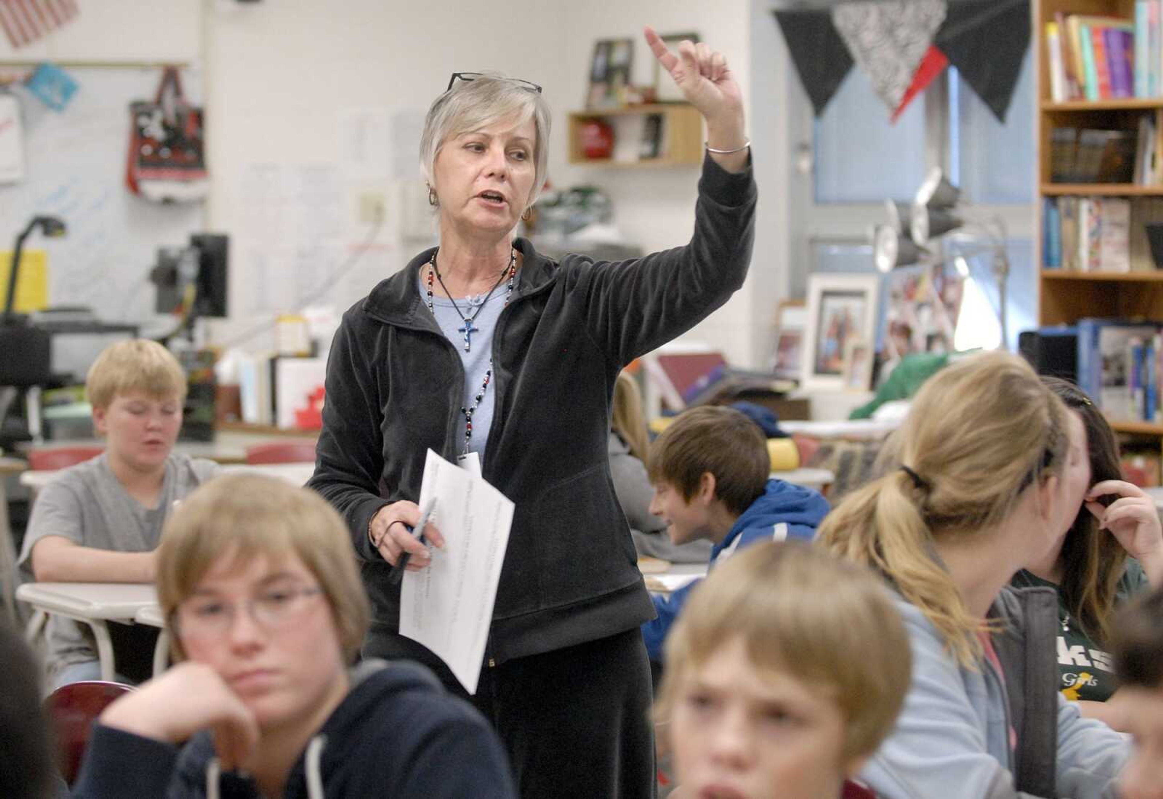 Sharlett Eftink takes questions Tuesday from eighth-grade students during their communication arts class. (Laura Simon)