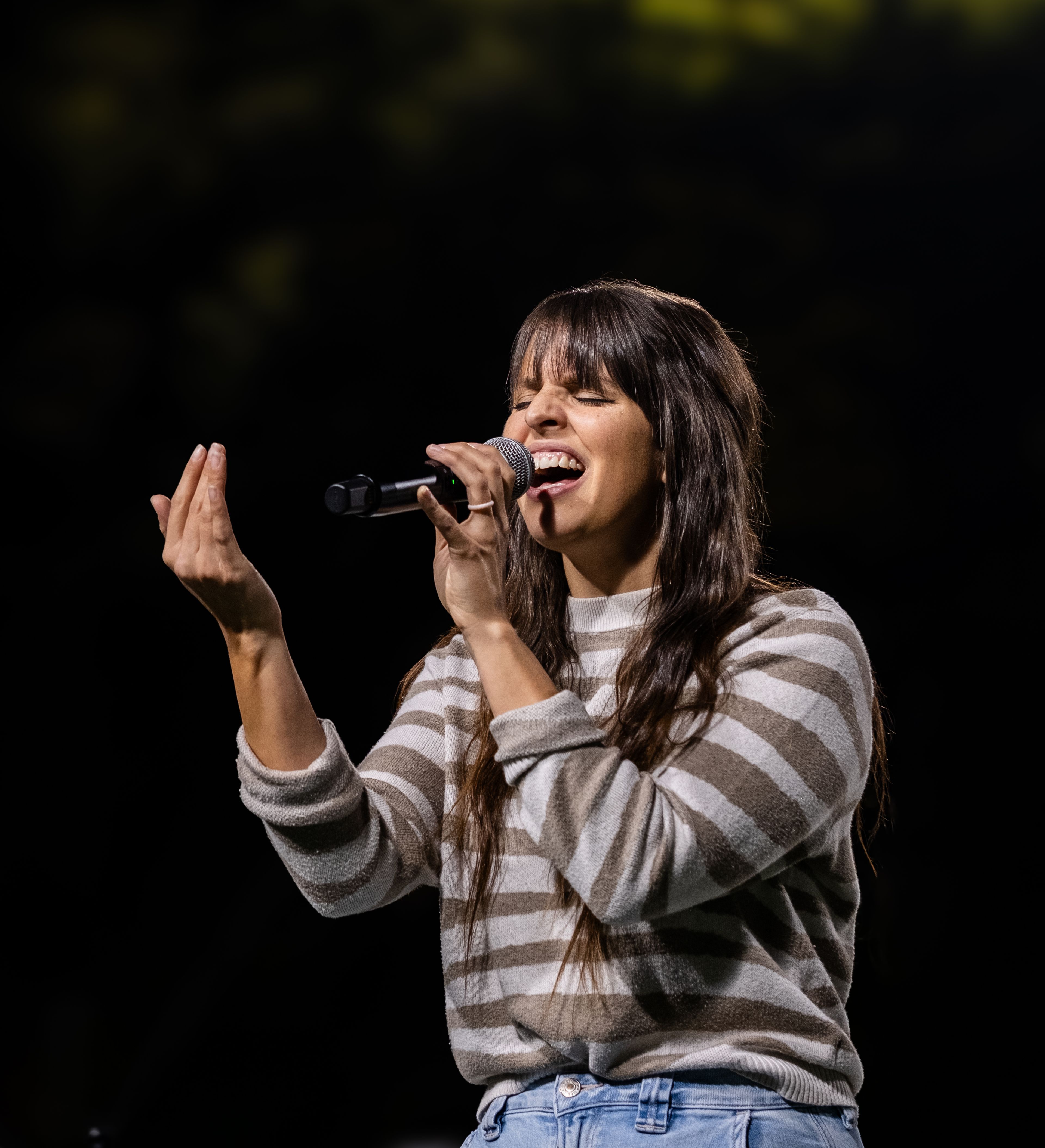 Kayla Brooks of Jackson lights up Houck Stadium with her soulful performance at Fields of Faith on Wednesday, Oct. 9.