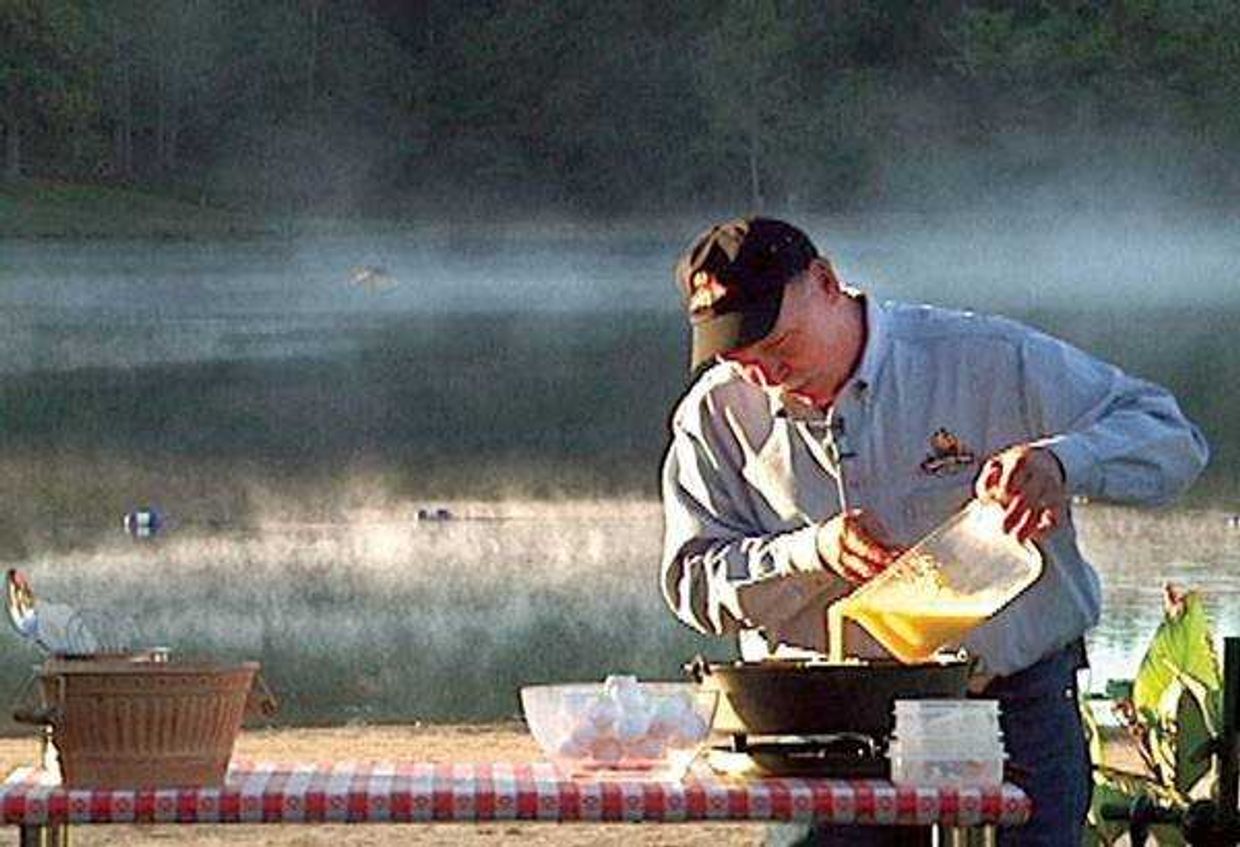 Johnny Nix prepared one of his recipes outdoors for "Campfire Cafe," which is produced in Marble Hill, Mo.