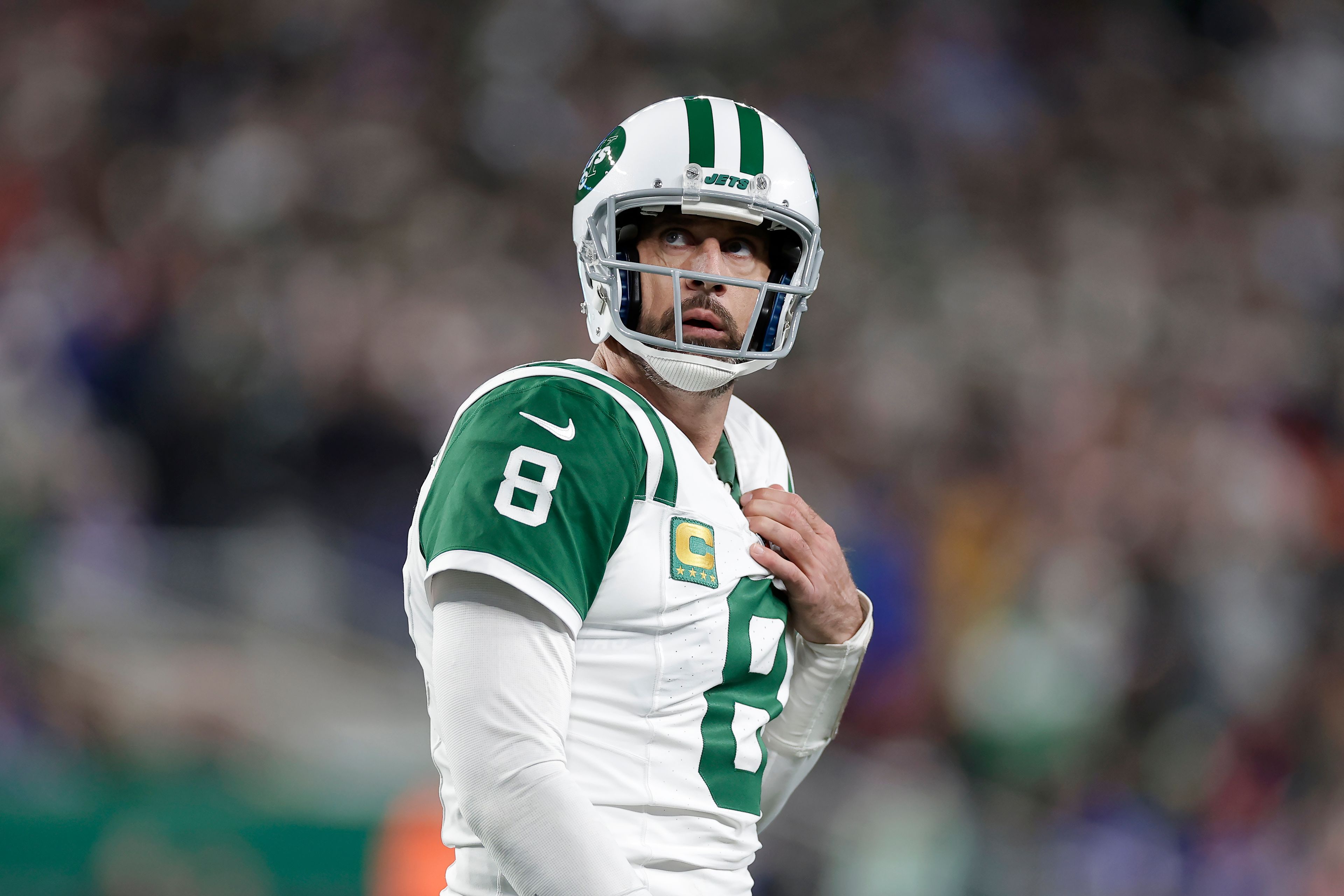 New York Jets quarterback Aaron Rodgers walks on the field during the second half of an NFL football game against the Buffalo Bills in East Rutherford, N.J., Monday, Oct. 14, 2024. (AP Photo/Adam Hunger)