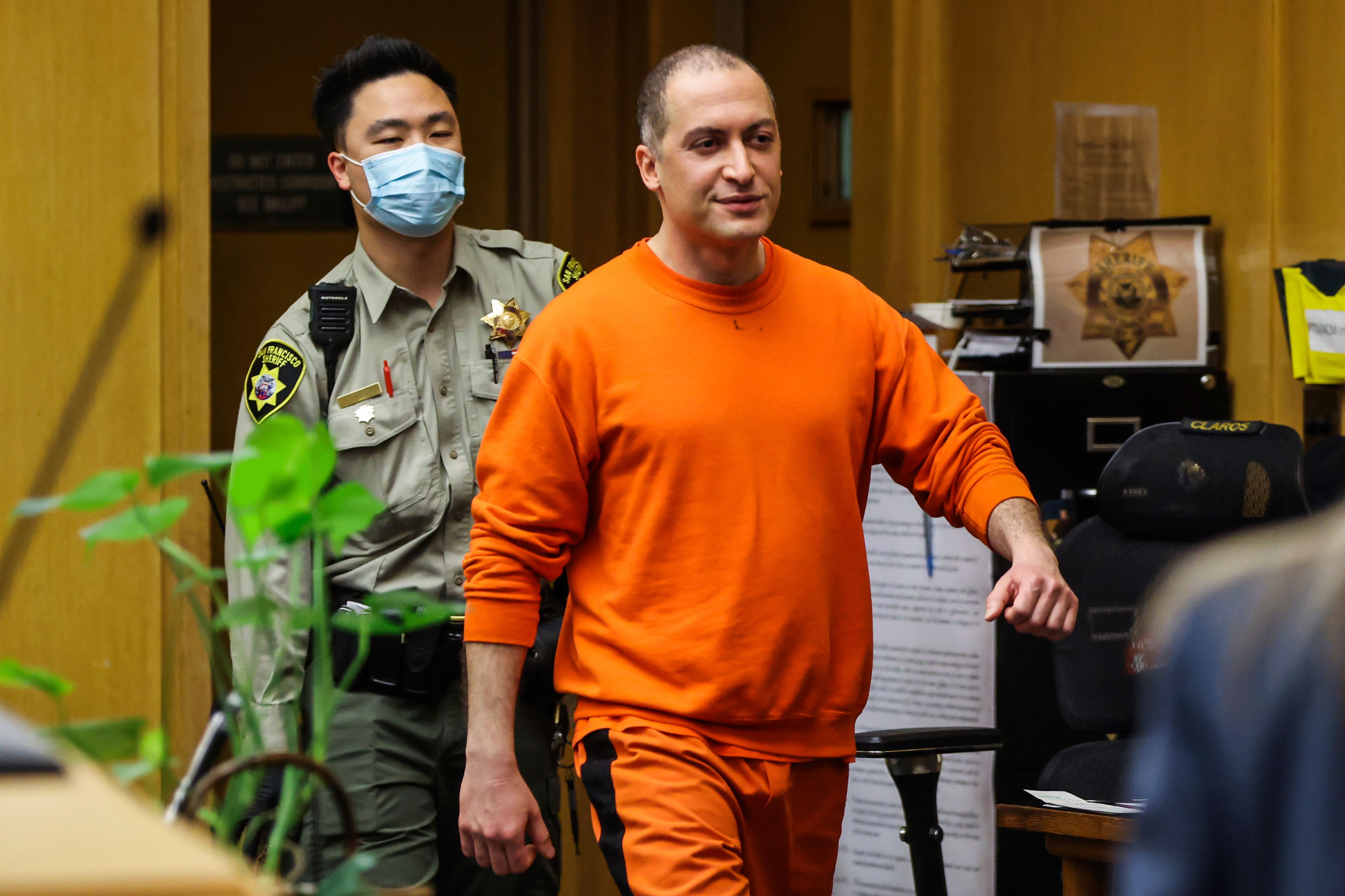 FILE - Nima Momeni, the man charged in the fatal stabbing of Cash App founder Bob Lee, makes his way into the courtroom for his arraignment in San Francisco, May 2, 2023. (Gabrielle Lurie/San Francisco Chronicle via AP, Pool, File)