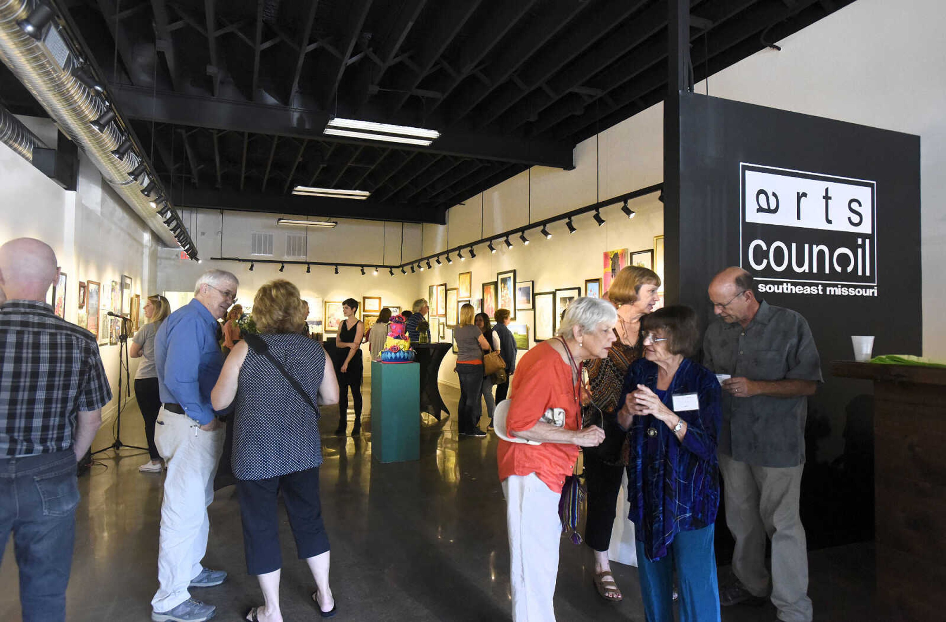 LAURA SIMON ~ lsimon@semissourian.com

People take in the grand opening reception for the 4th annual Members Exhibit at the Arts Council of Southeast Missouri in its new location at 16 North Spanish Street in downtown Cape Girardeau on Friday, Sept. 2, 2016.