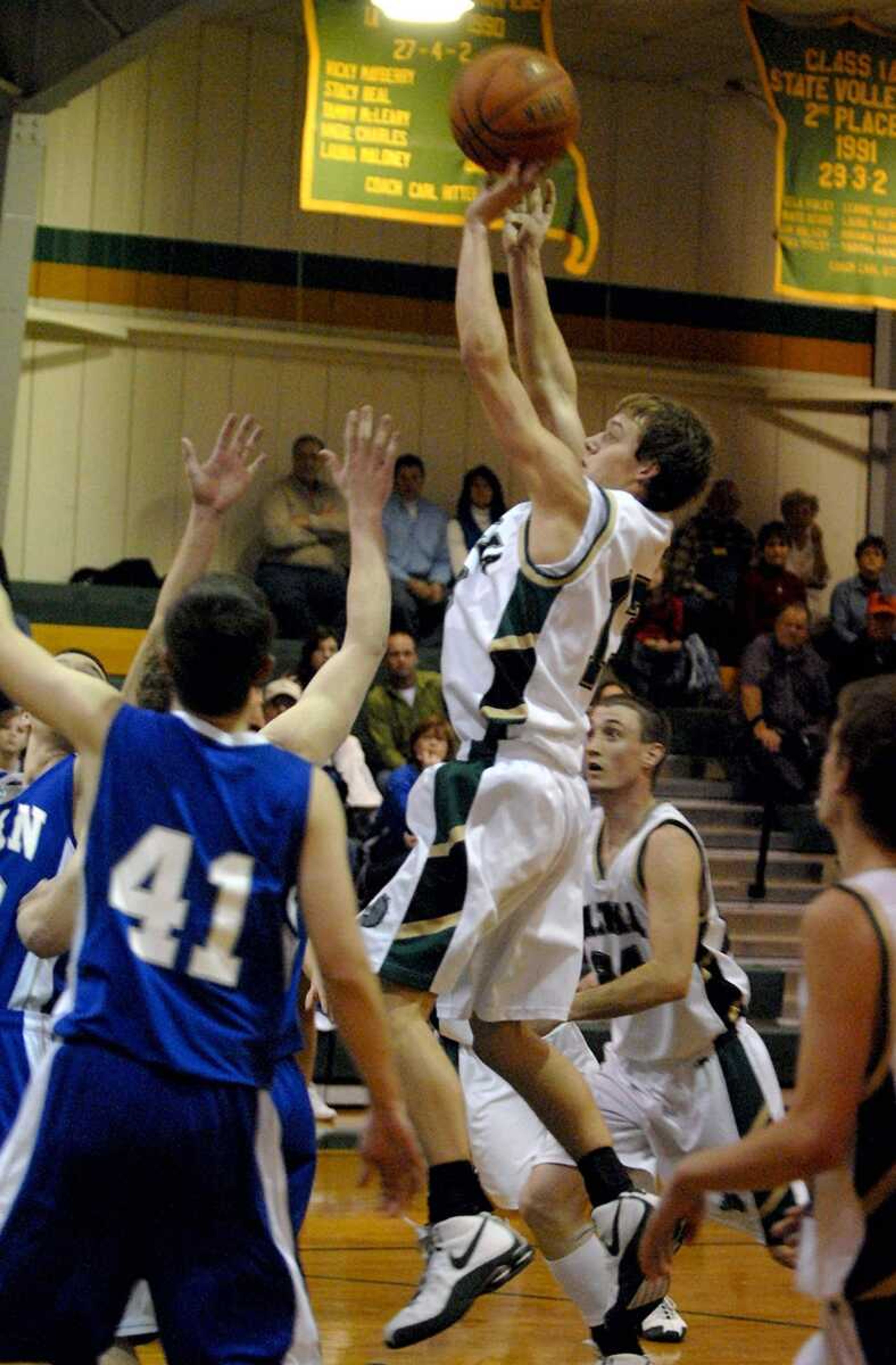 ELIZABETH DODD ~ edodd@semissourian.com<br>Zalma's Stephen Simmers releases a shot that found its target during the second half Tuesday against Oran at Zalma. The host Bulldogs won ??-??. Story on Page 3B.