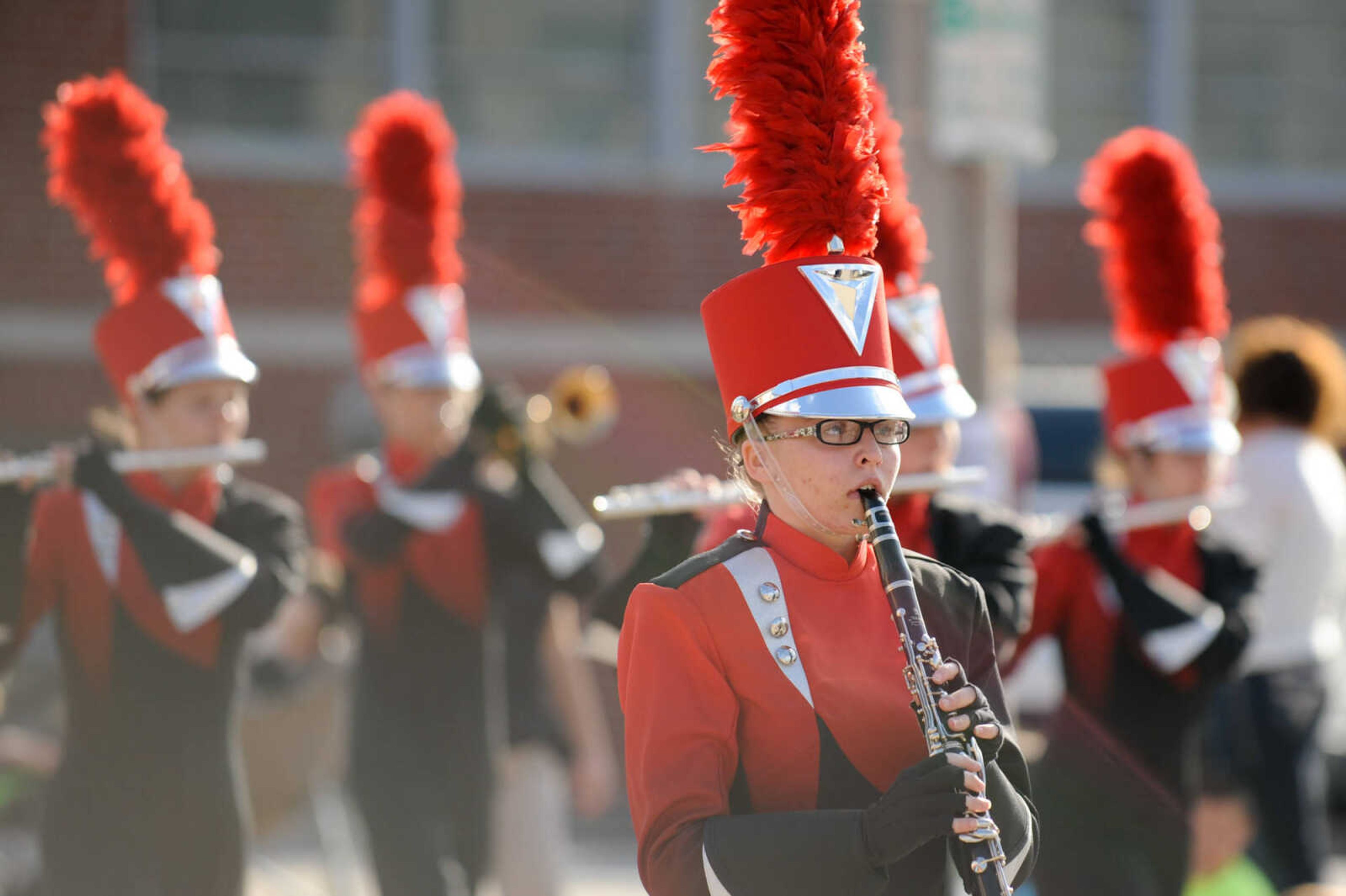 GLENN LANDBERG ~ glandberg@semissourian.com

Members of the Woodland High School marching band play a song while moving through Uptown Jackson during the Jackson Band Festival parade Tuesday, Oct. 6, 2015.