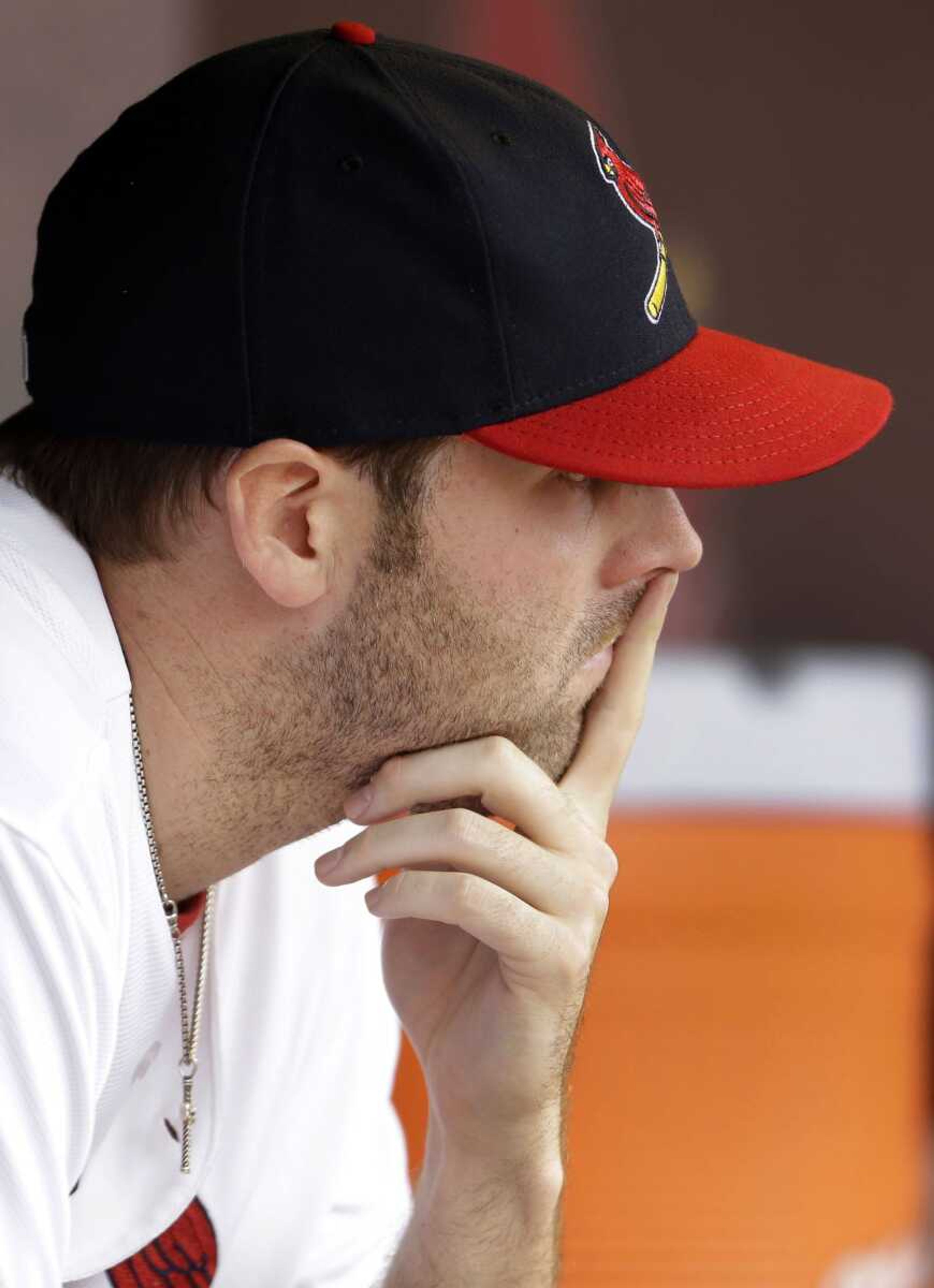 St. Louis Cardinals relief pitcher Mitchell Boggs sits in the dugout after being pulled out of a baseball game during the ninth inning against the Pittsburgh Pirates, Sunday, April 28, 2013, in St. Louis. The Pirates won 9-0. (AP Photo/Jeff Roberson)