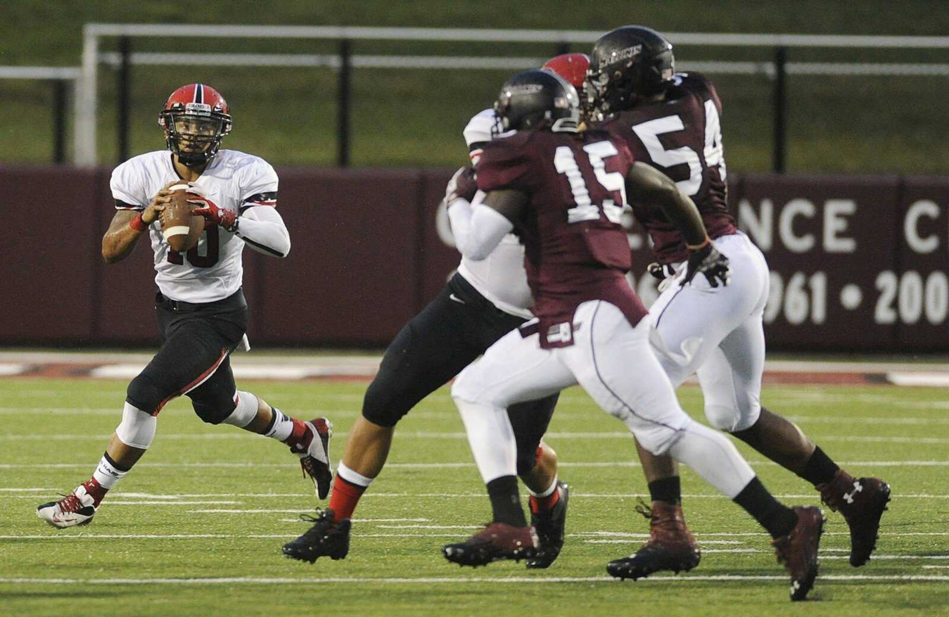 Southeast Missouri State quarterback Blake Jackson drops back to pass during the Redhawks&#8217; 35-14 loss to Southern Illinois on Saturday. (ADAM VOGLER)