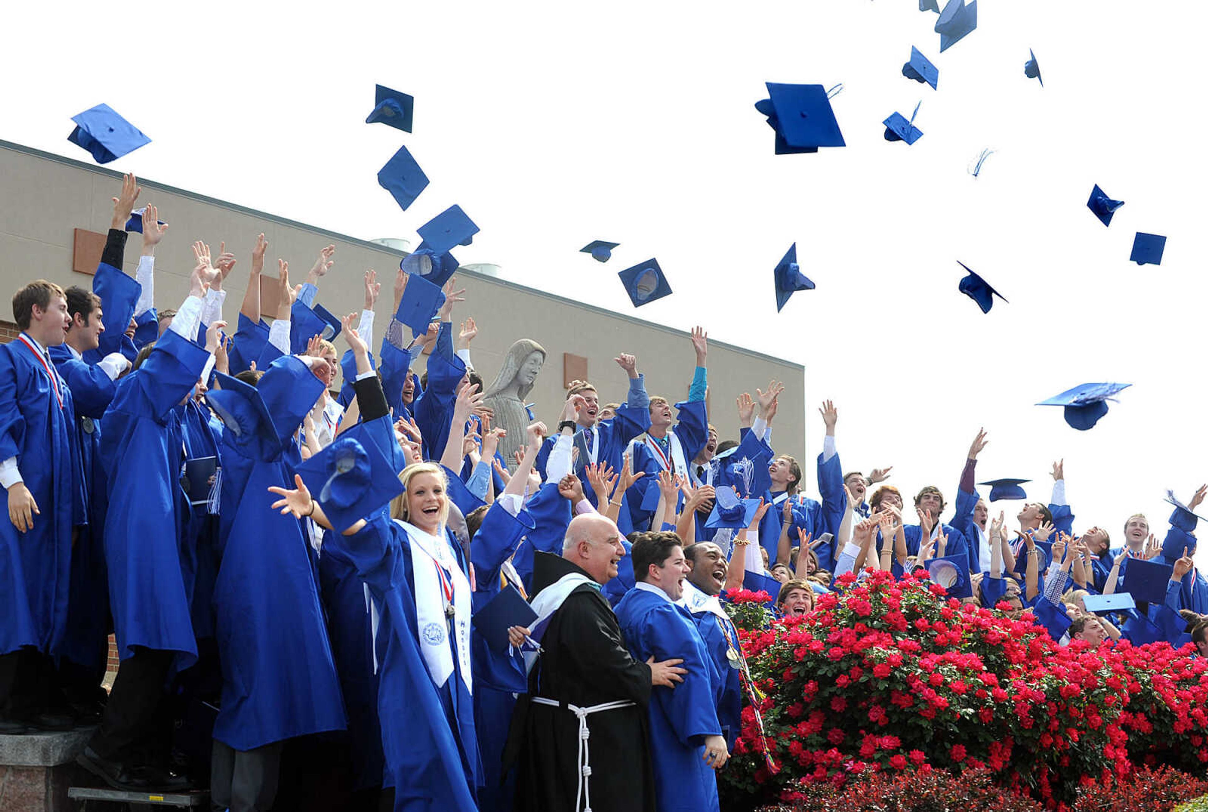 LAURA SIMON ~ lsimon@semissourian.com

The eighty-fifth graduating class of Notre Dame Regional High School throw their hats in the air, Sunday, May 19, 2013, in celebration of their commencement.