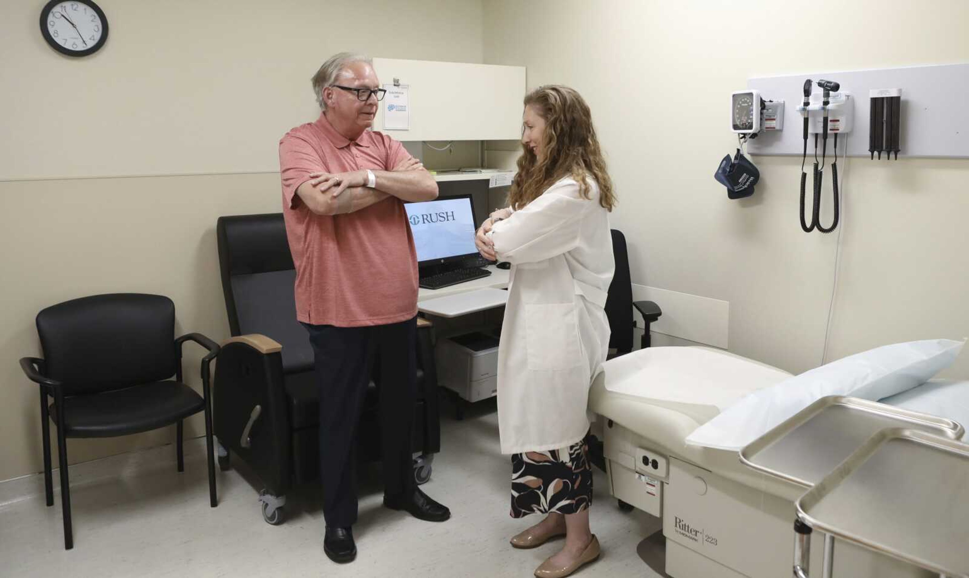 Dr. Jori Fleisher, a neurologist, examines Tom Doyle, 66, on July 9 at Rush University Medical Center in Chicago.<br>Doyle, 66, hopes blood tests may someday replace the invasive diagnostic testing he endured to be diagnosed 4   years ago with Lewy body dementia.