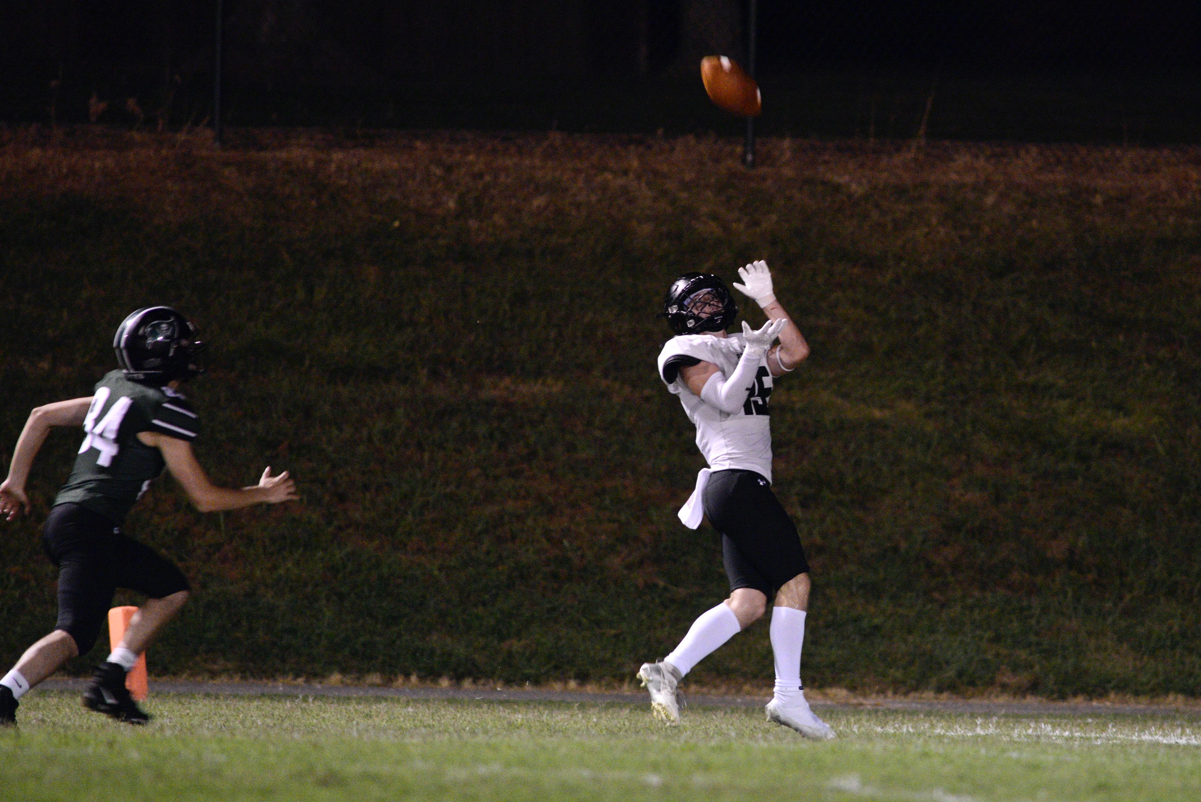 Perryville receiver Cole Lane catches a touchdown pass during the Midnight Game on Saturday, Aug. 17, at Perryville High School.