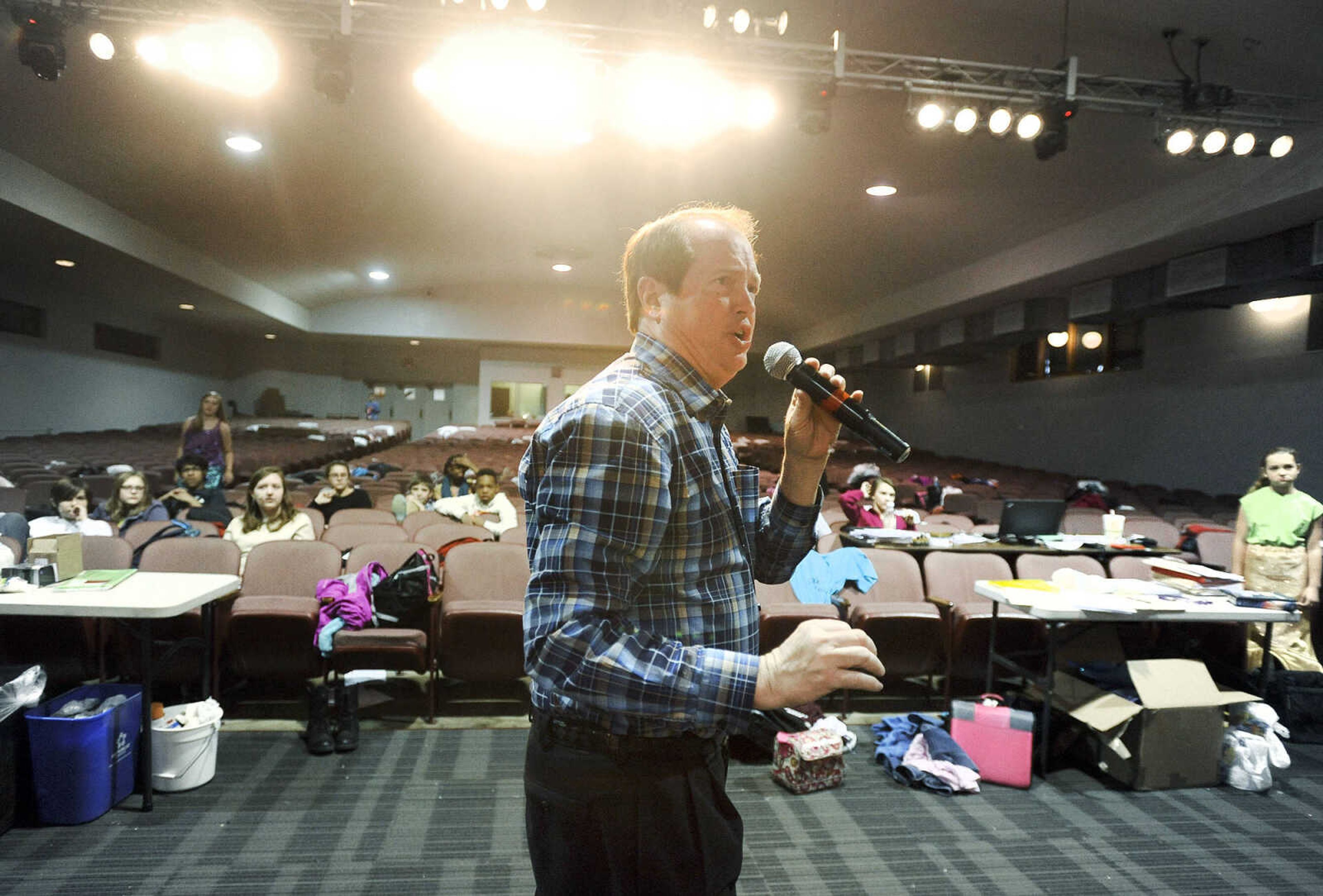 LAURA SIMON ~ lsimon@semissourian.com

Mike Dumey, choir teacher and director of Cape Central Junior High School's production of 'The Little Mermaid', works with students during their rehearsal Wednesday, Feb. 24, 2016.