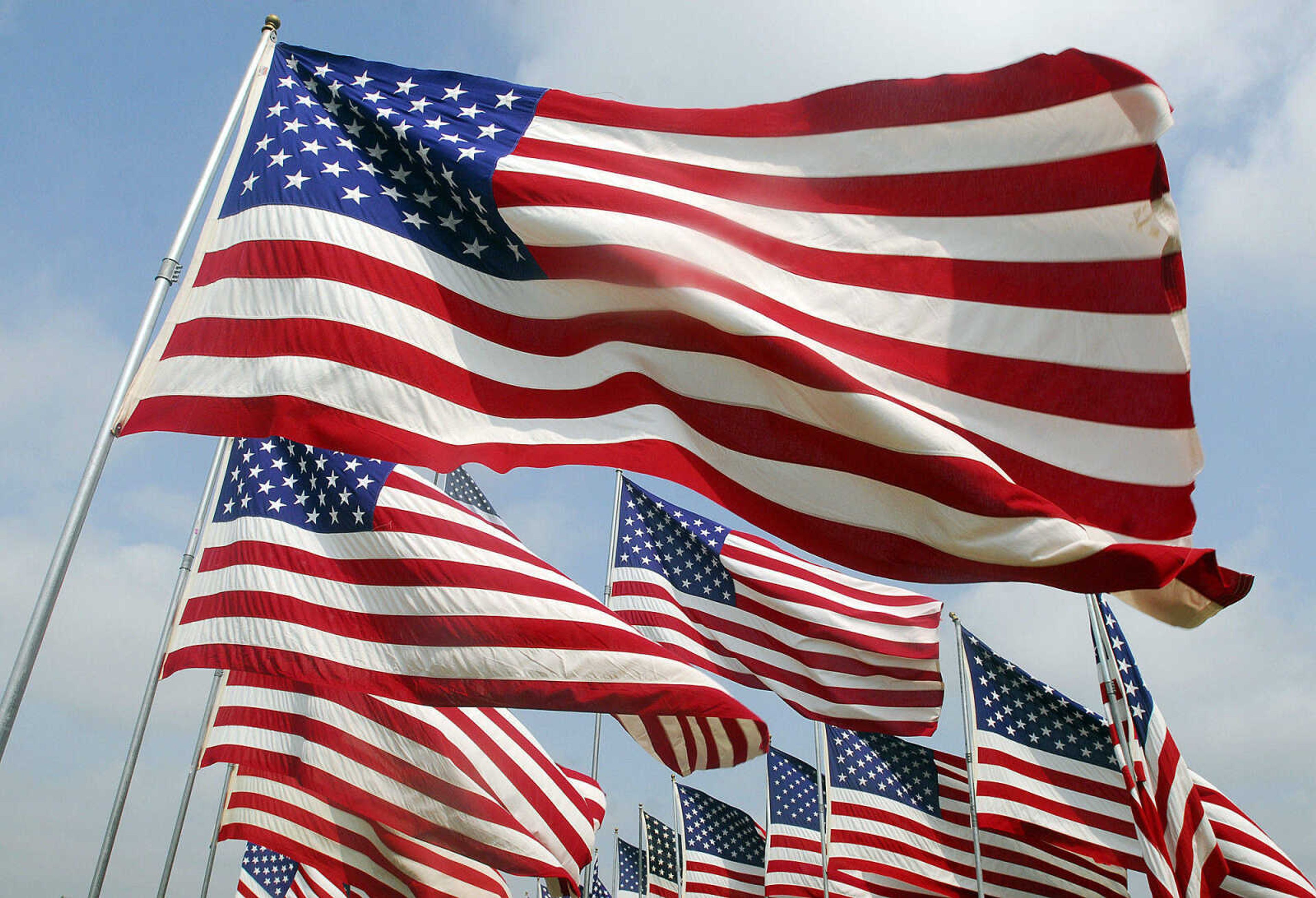 LAURA SIMON~lsimon@semissourian.com
The stars and stripes wave in the wind Monday, May 31, 2010 at North Cape County Park in Cape Girardeau.