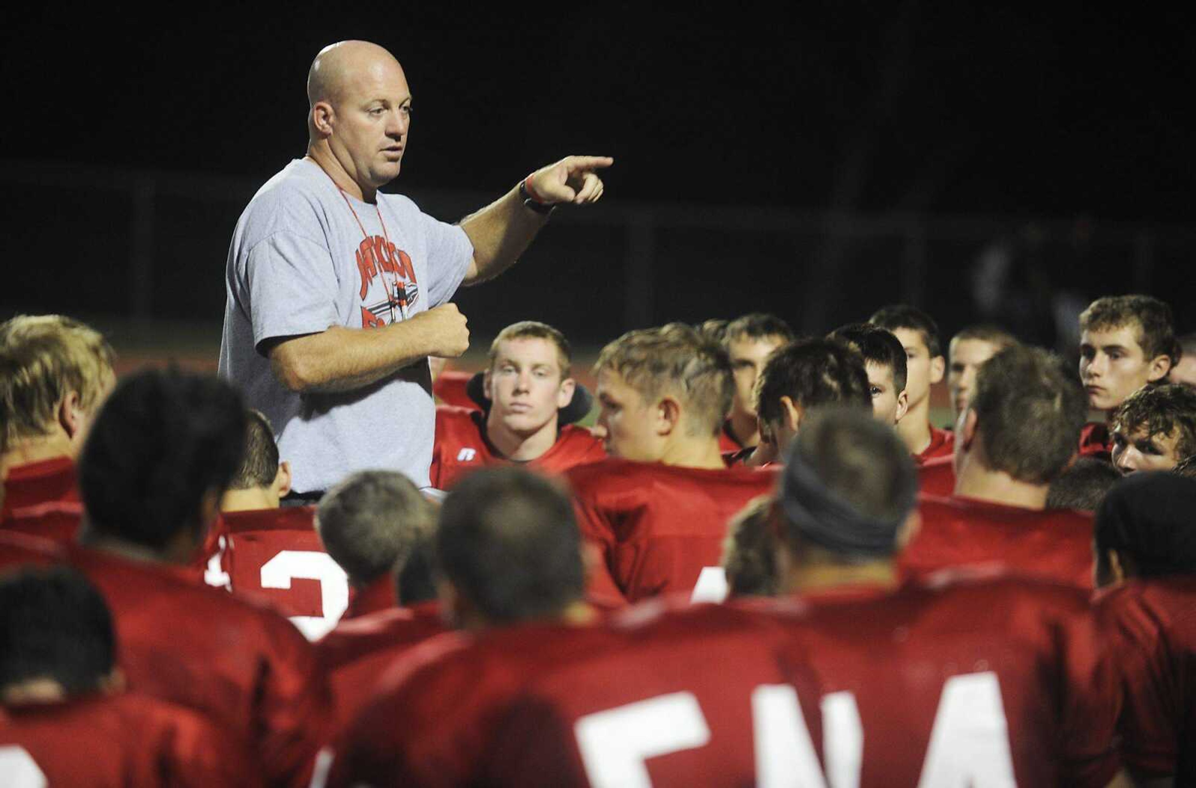 Jackson coach Brent Eckley talks to his team after Friday's jamboree in Hillsboro, Mo. (ADAM VOGLER)