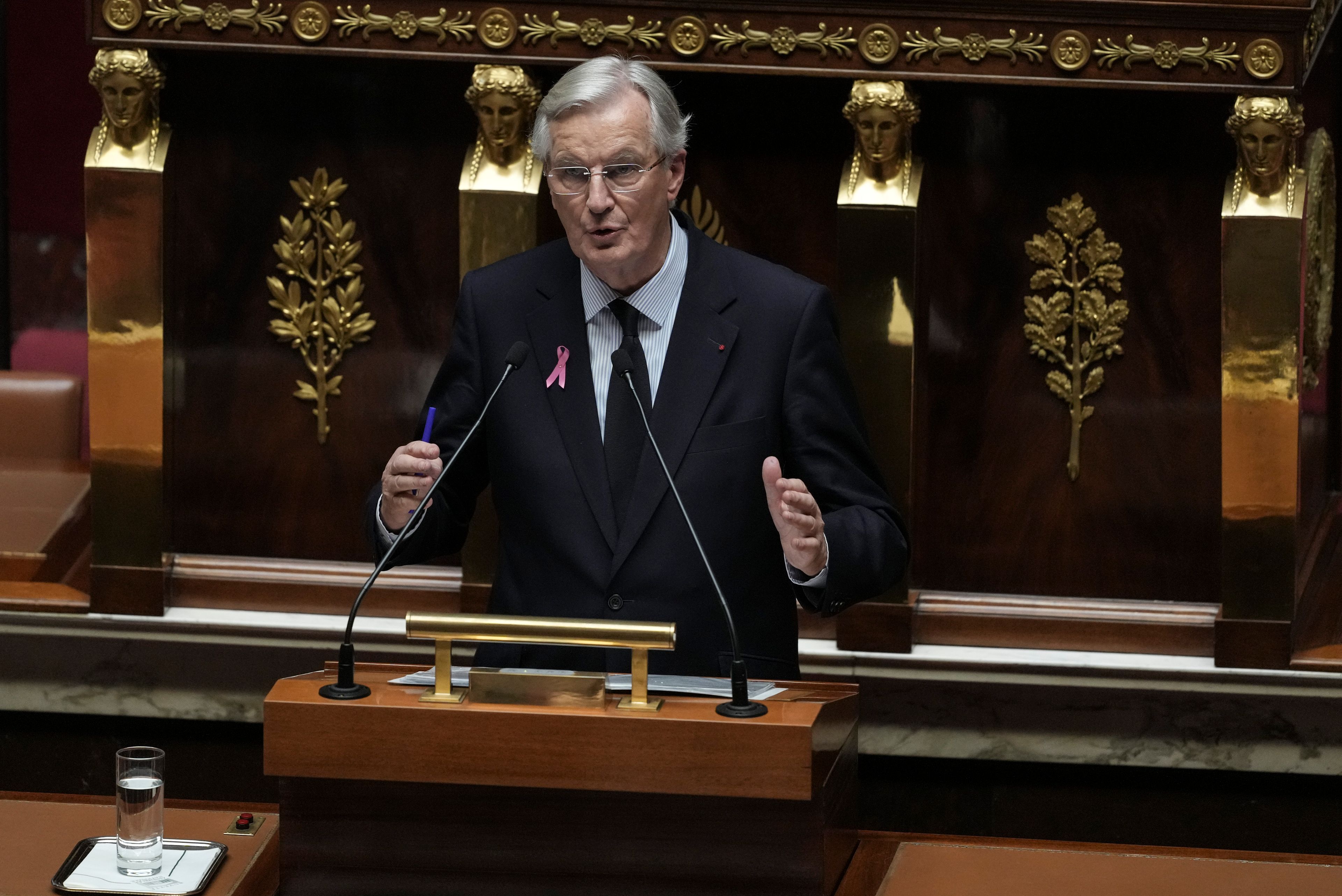 France's Prime Minister Michel Barnier gestures as delivers a speech at the National Assembly, in Paris, Tuesday, Oct. 1, 2024. (AP Photo/Thibault Camus)