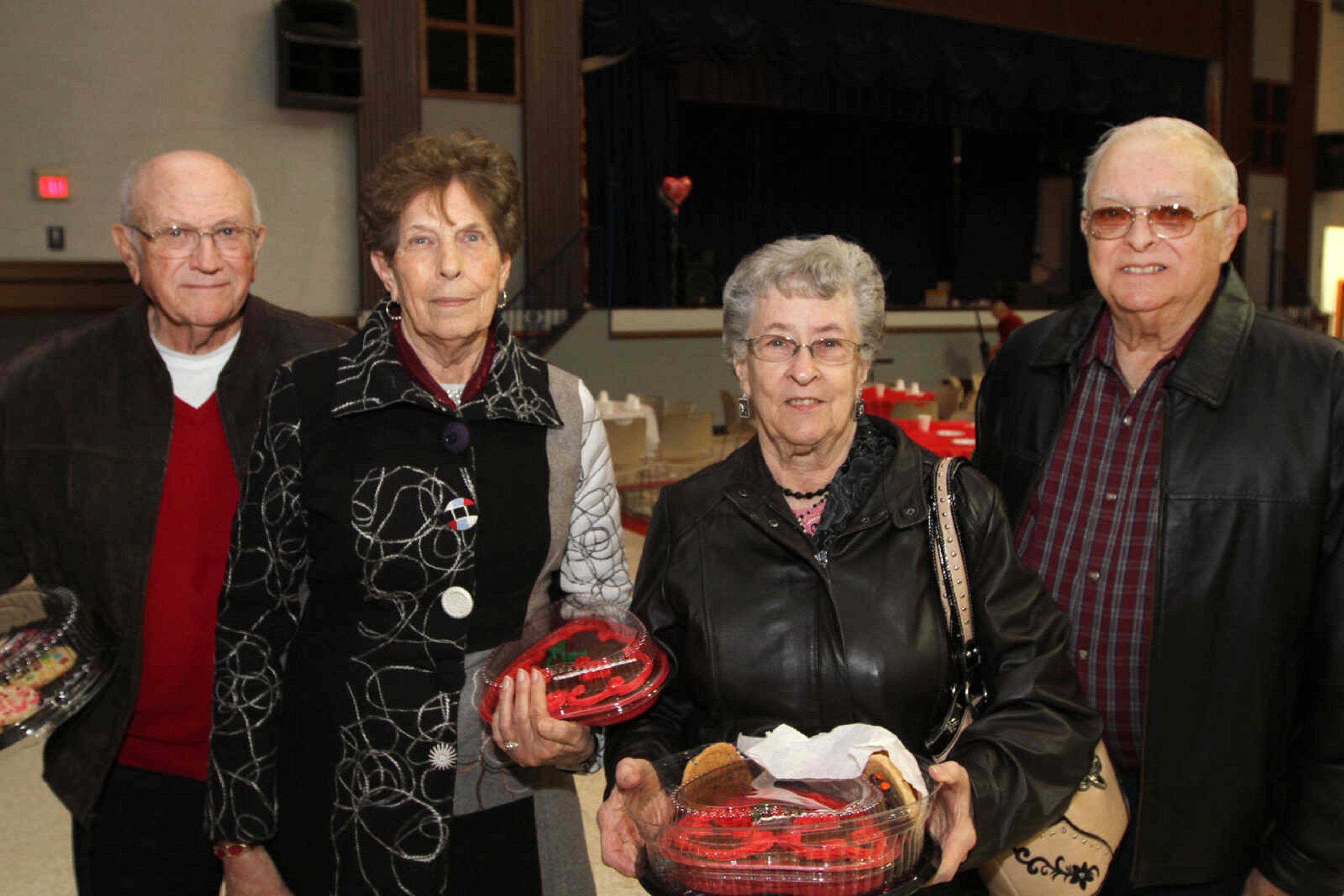 GLENN LANDBERG ~ glandberg@semissourian.com

Johnny and Joann Hahn, left, pose for a photo with Paul and Mary Friese during the Valentine's Party sponsored by Schnucks Supermarket for couples who have been married for 50 or more years at the Arena Building Friday, Feb. 13, 2015.