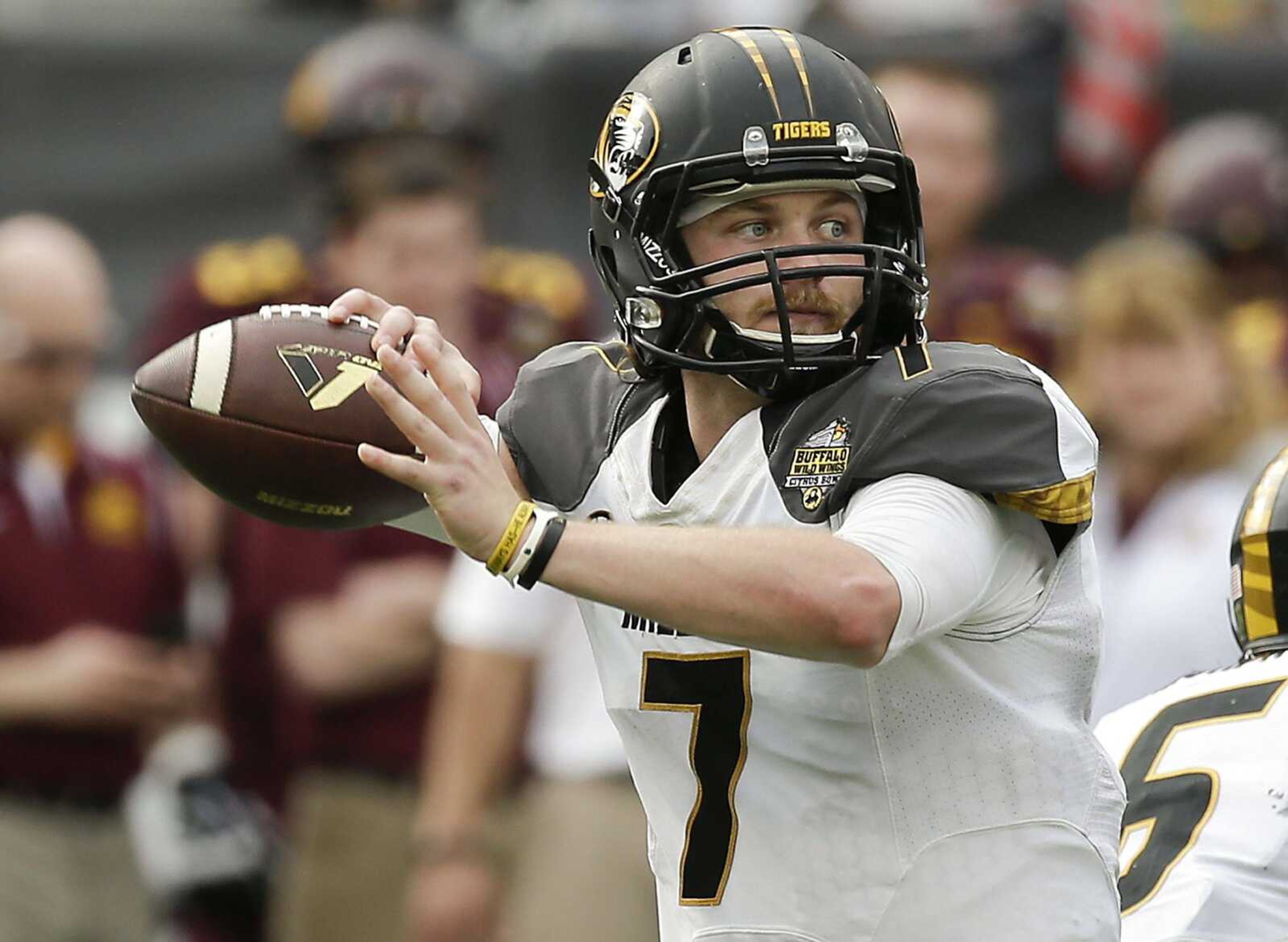 Missouri quarterback Maty Mauk throws a pass against Minnesota during the second half of the Citrus Bowl NCAA college football game in Orlando, Fla., Thursday, Jan. 1, 2015. Missouri won 33-17. (AP Photo/John Raoux)