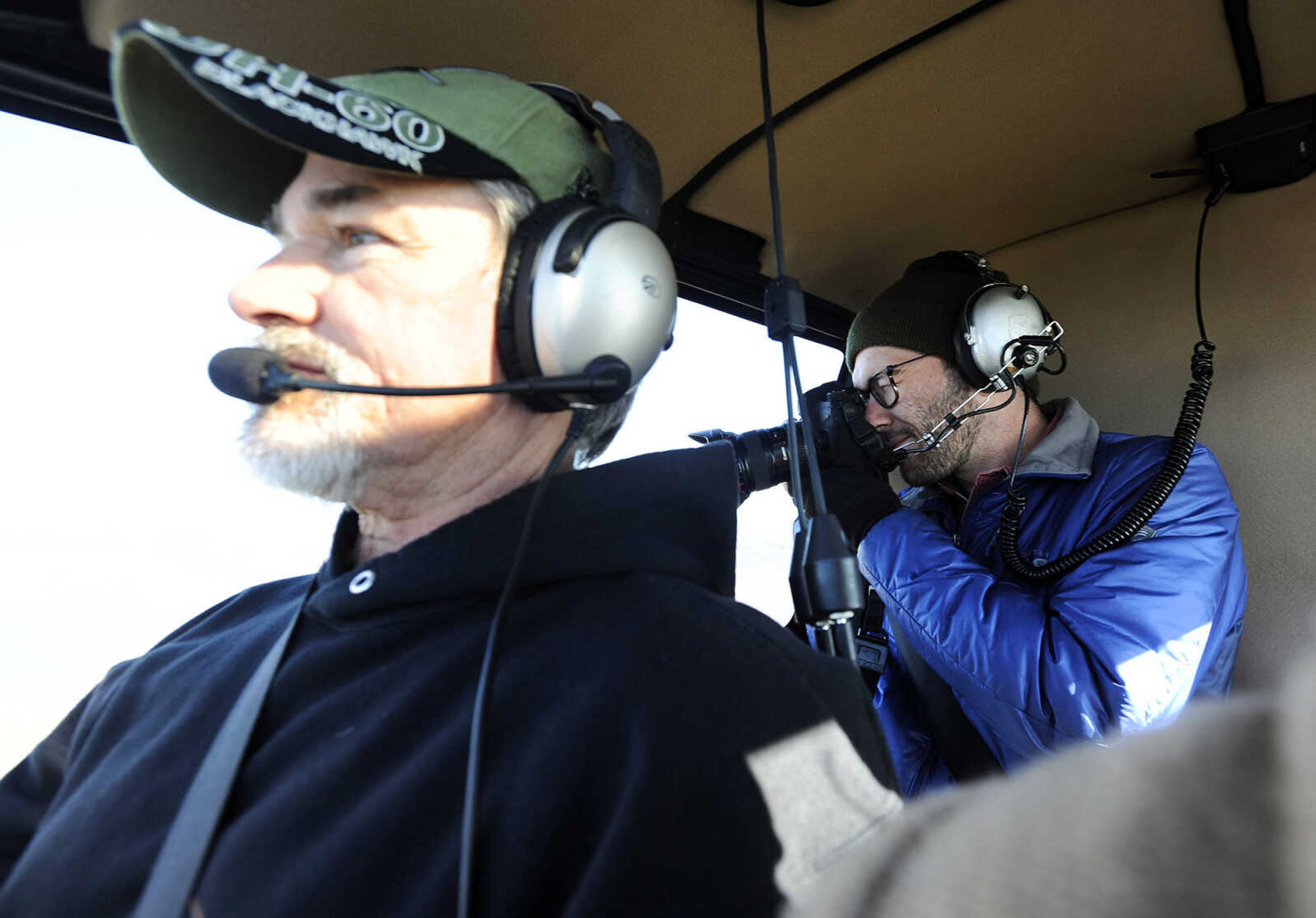 LAURA SIMON ~ lsimon@semissourian.com

Dean Houseman with Cape Copters flies over the flooded areas along the Mississippi River with Glenn Landberg, staff photographer at the Southeast Missourian, Saturday, Jan. 2, 2016.