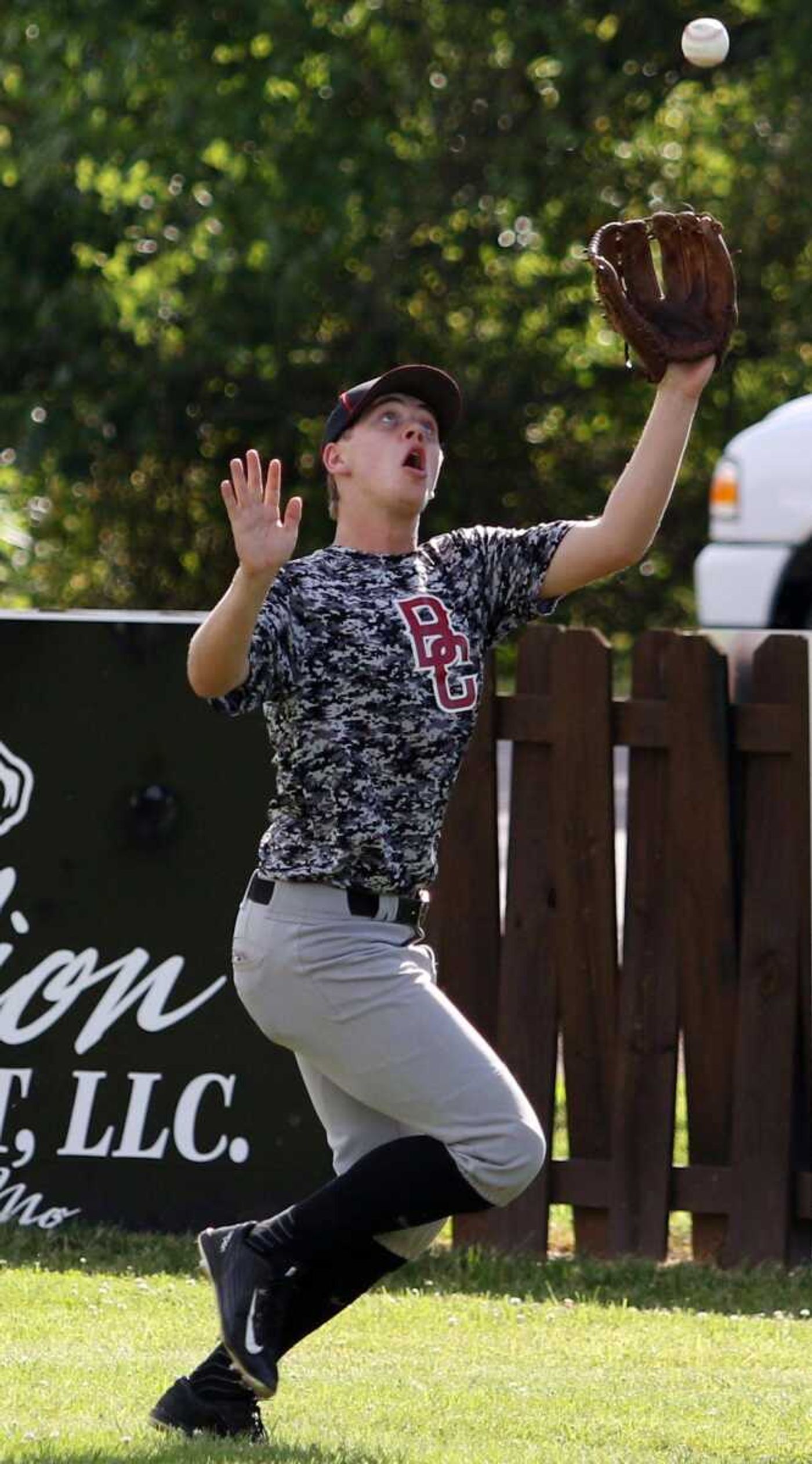 Bell City right fielder Brandon Abner races after a fly ball.