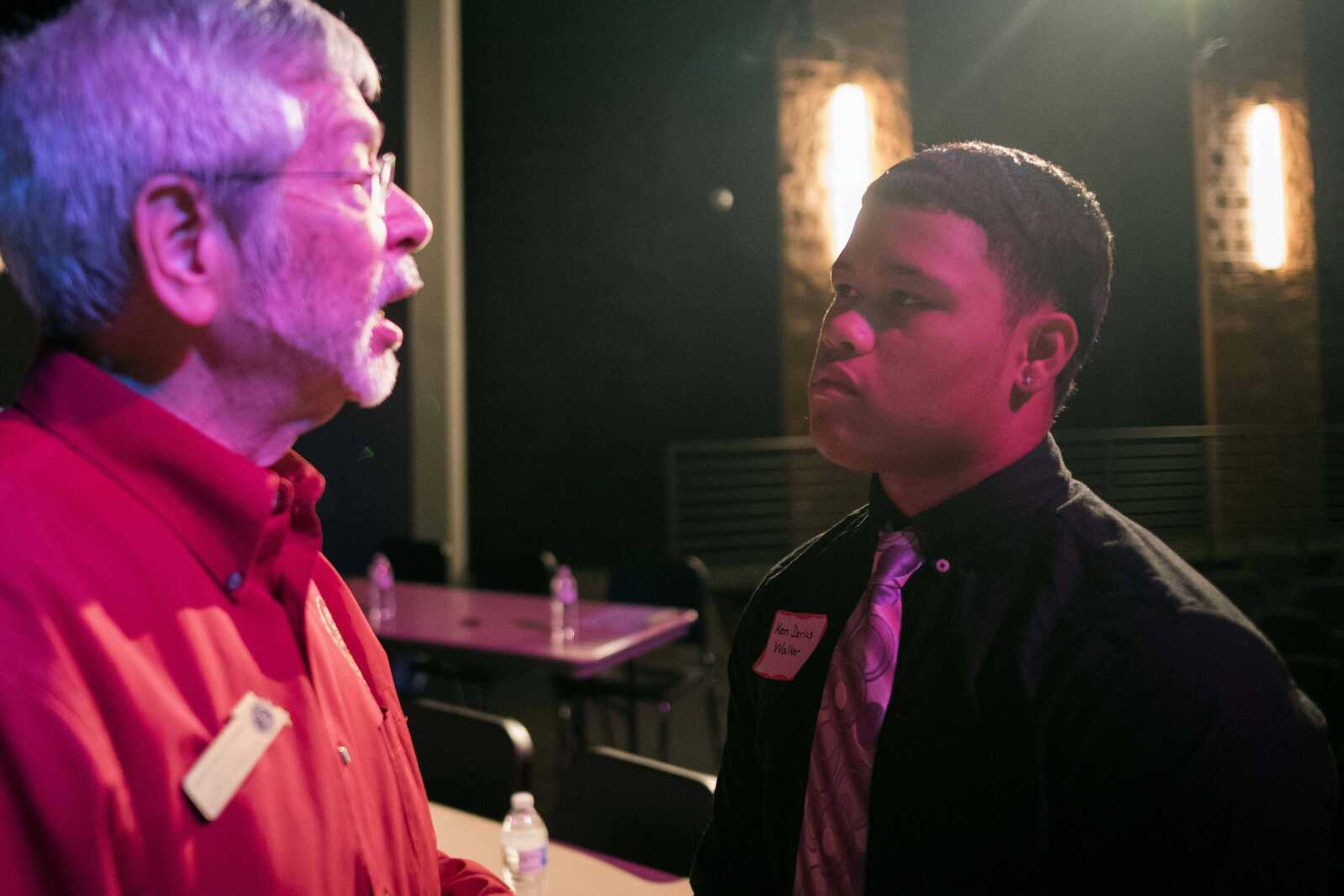 State Senator Wayne Wallingford, left, talks with Honorable Young Men Club member Ken Darius Walker during a visit from regional politicians and members of the Missouri state legislature's black caucus Friday, Oct. 25, 2019, at Cape Central High School.