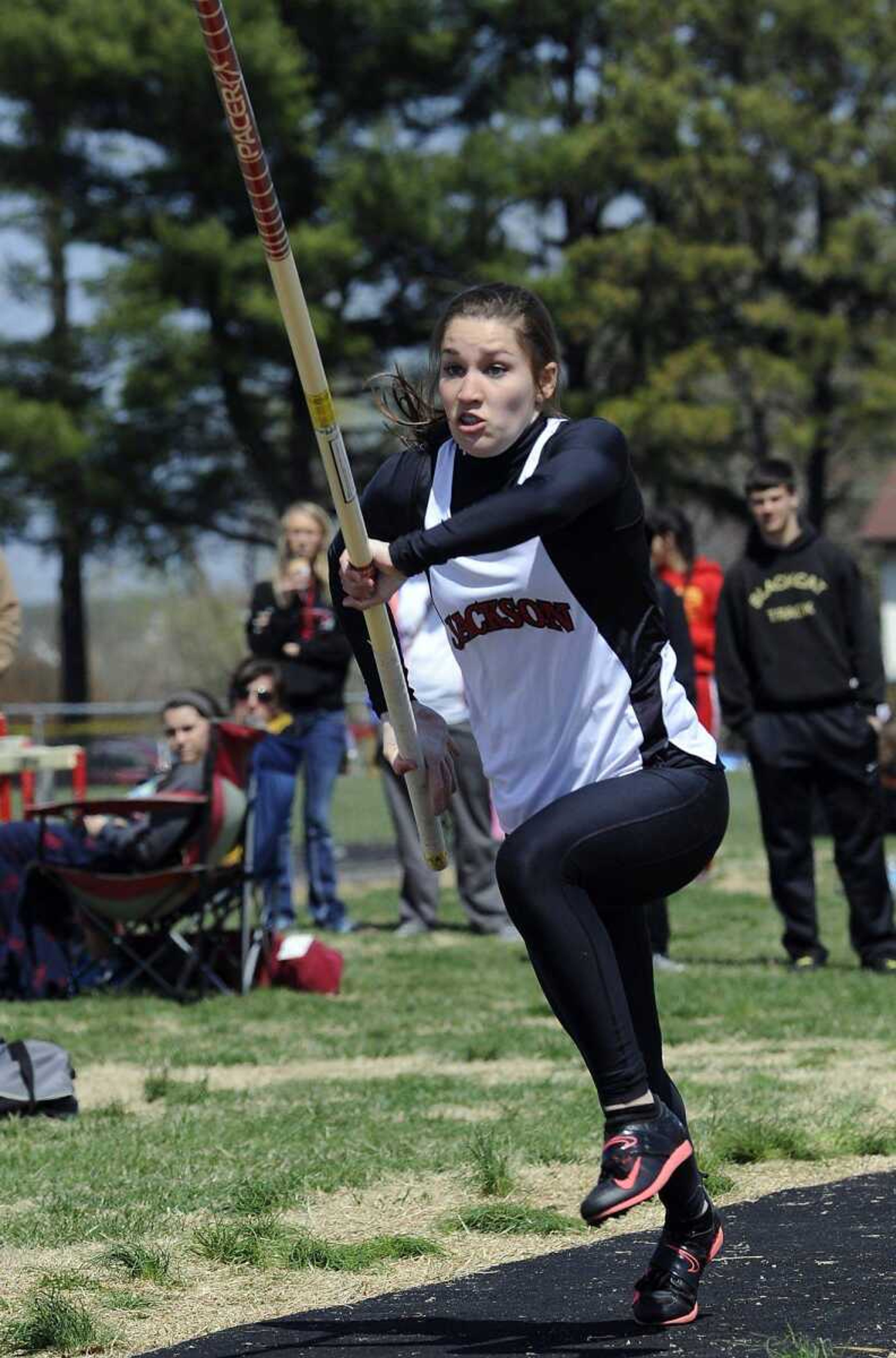 Jackson&#8217;s Sierra Maddox begins her run to clear 12 feet, 6 inches in the pole vault event Saturday at the Jackson Invitational in Jackson. Maddox placed first in the event. (Fred Lynch)