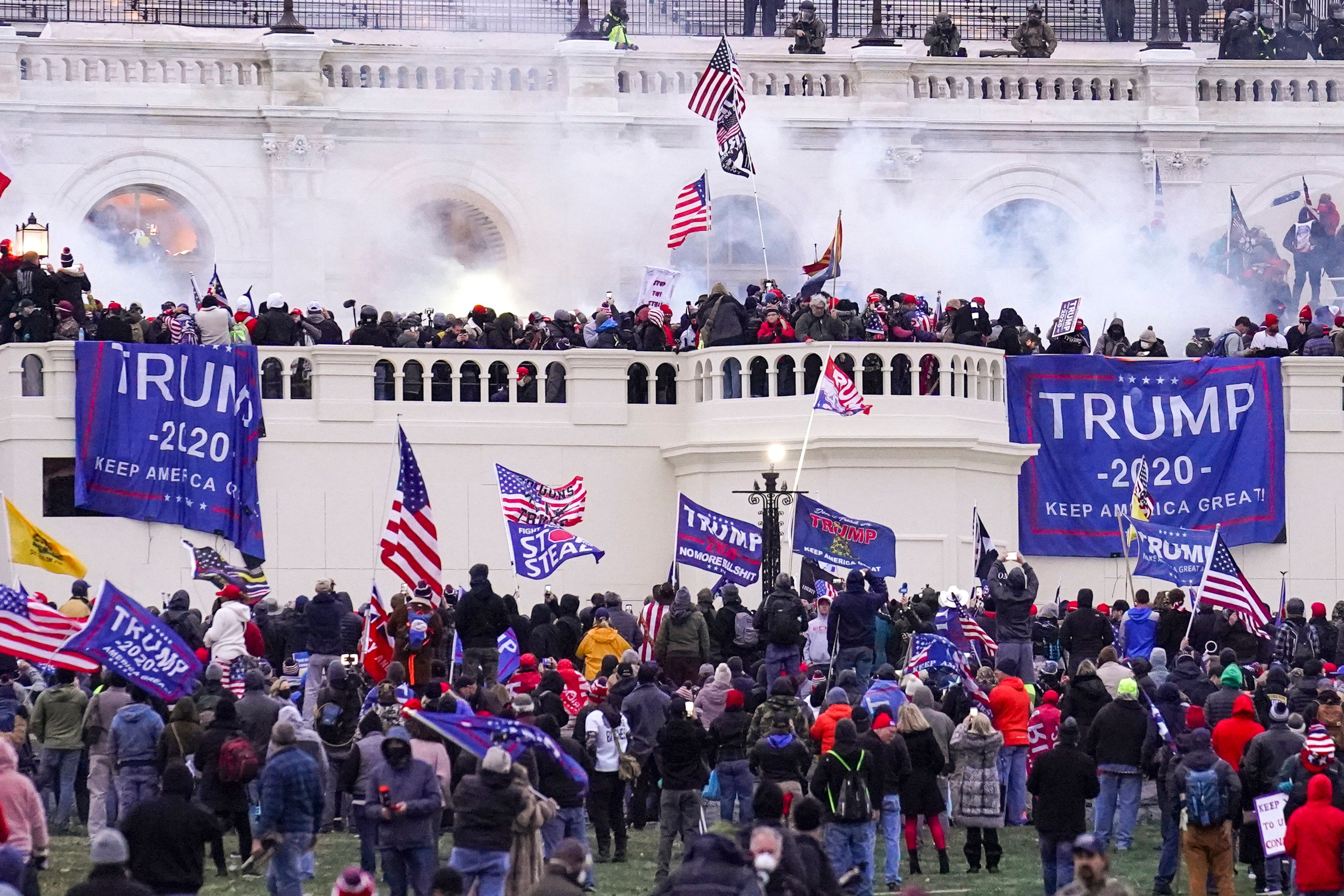 FILE - Rioters loyal to President Donald Trump storm the Capitol, Jan. 6, 2021, in Washington. (AP Photo/John Minchillo, File)