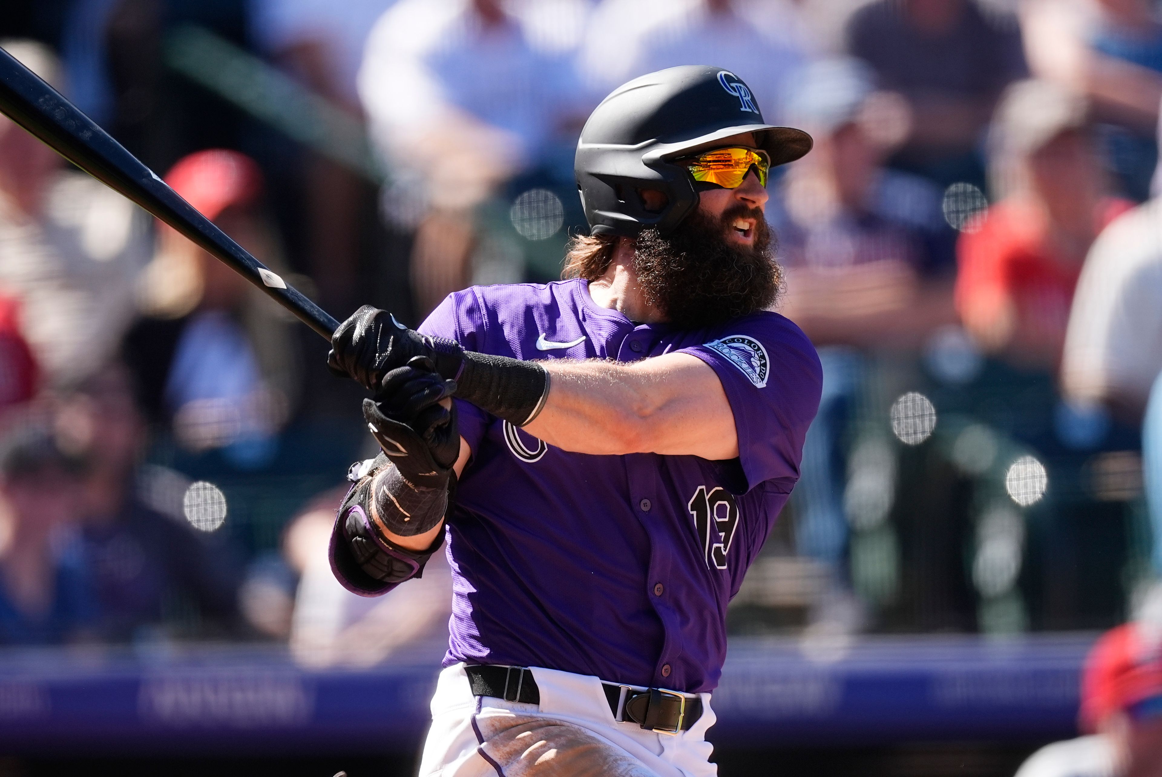 Colorado Rockies' Charlie Blackmon follows the flight of his two-run home run off St. Louis Cardinals starting pitcher Kyle Gibson in second inning of a baseball game Thursday, Sept. 26, 2024, in Denver. (AP Photo/David Zalubowski)