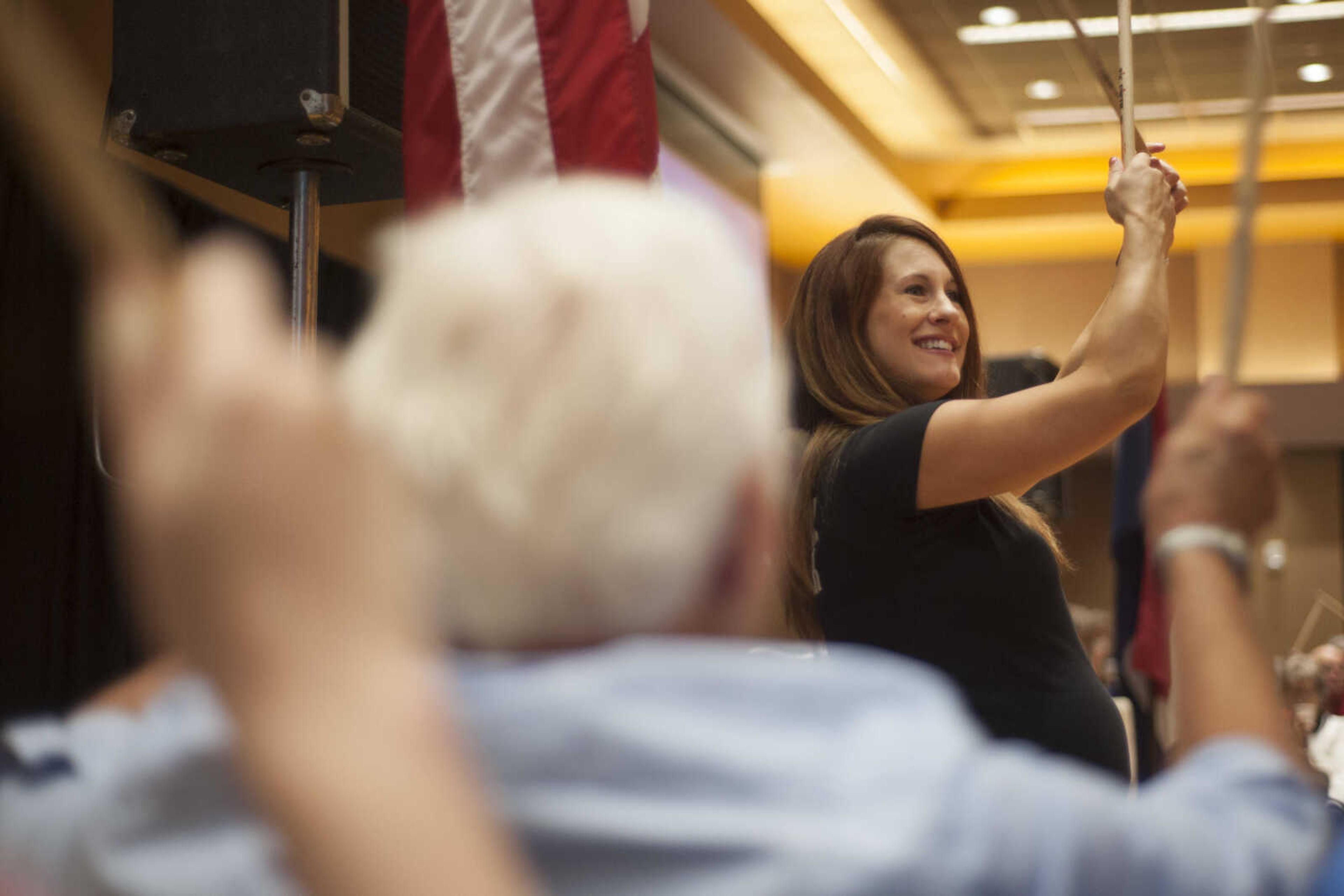 Christine Jaegers, right, leads a cardio drumming class during the TBY Active Living Expo Wednesday, Oct. 9, 2019, at the Isle Casino in Cape Girardeau.