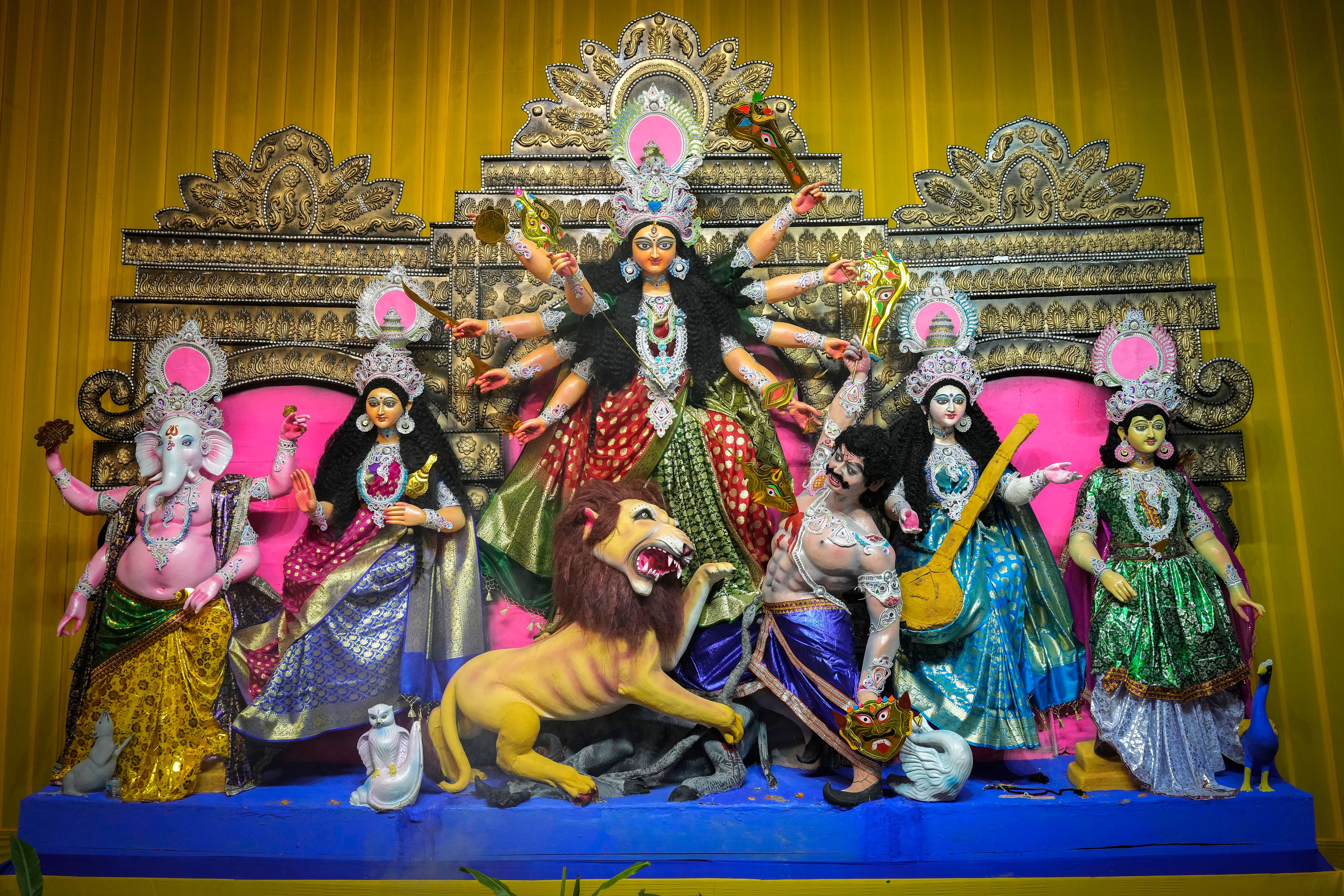 A tableau depicting the slaying of demon Mahishasura by the Hindu goddess Durga is installed for community worship during the Durga Puja festival in Guwahati, India, Wednesday, Oct. 9, 2024. (AP Photo/Anupam Nath)