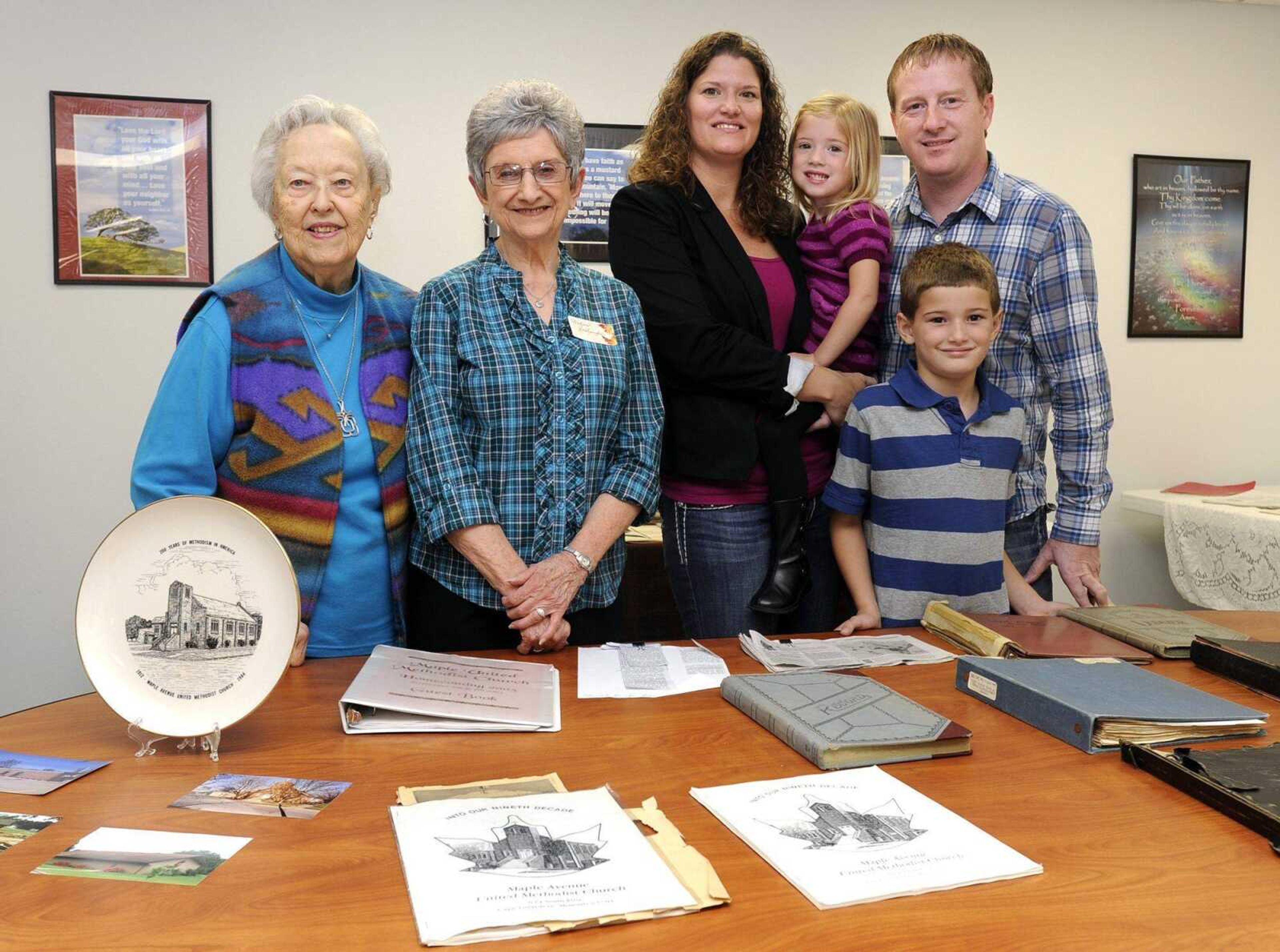 Maple Avenue United Methodist Church members, from left, Margie Ervin, Wilma Seabaugh, Heather and Brian Holdman and their children Ashlyn, 3, and Gavin, 6, gather Sept. 29 to celebrate the church's 100th anniversary. (Fred Lynch)