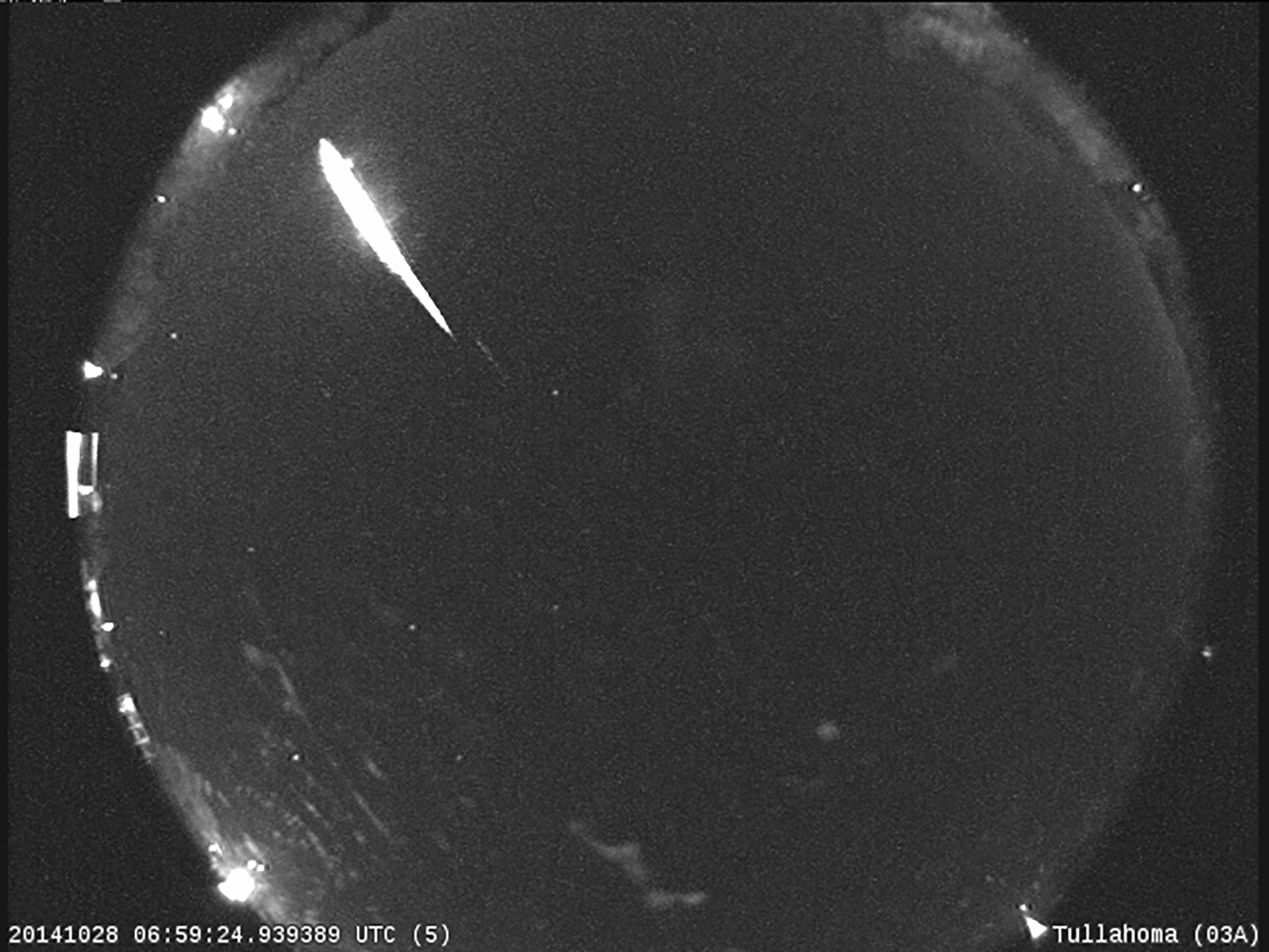 This 2014 image provided by NASA shows a Taurid fireball recorded at the NASA All Sky Fireball Network station in Tullahoma, Tenn. (NASA via AP)