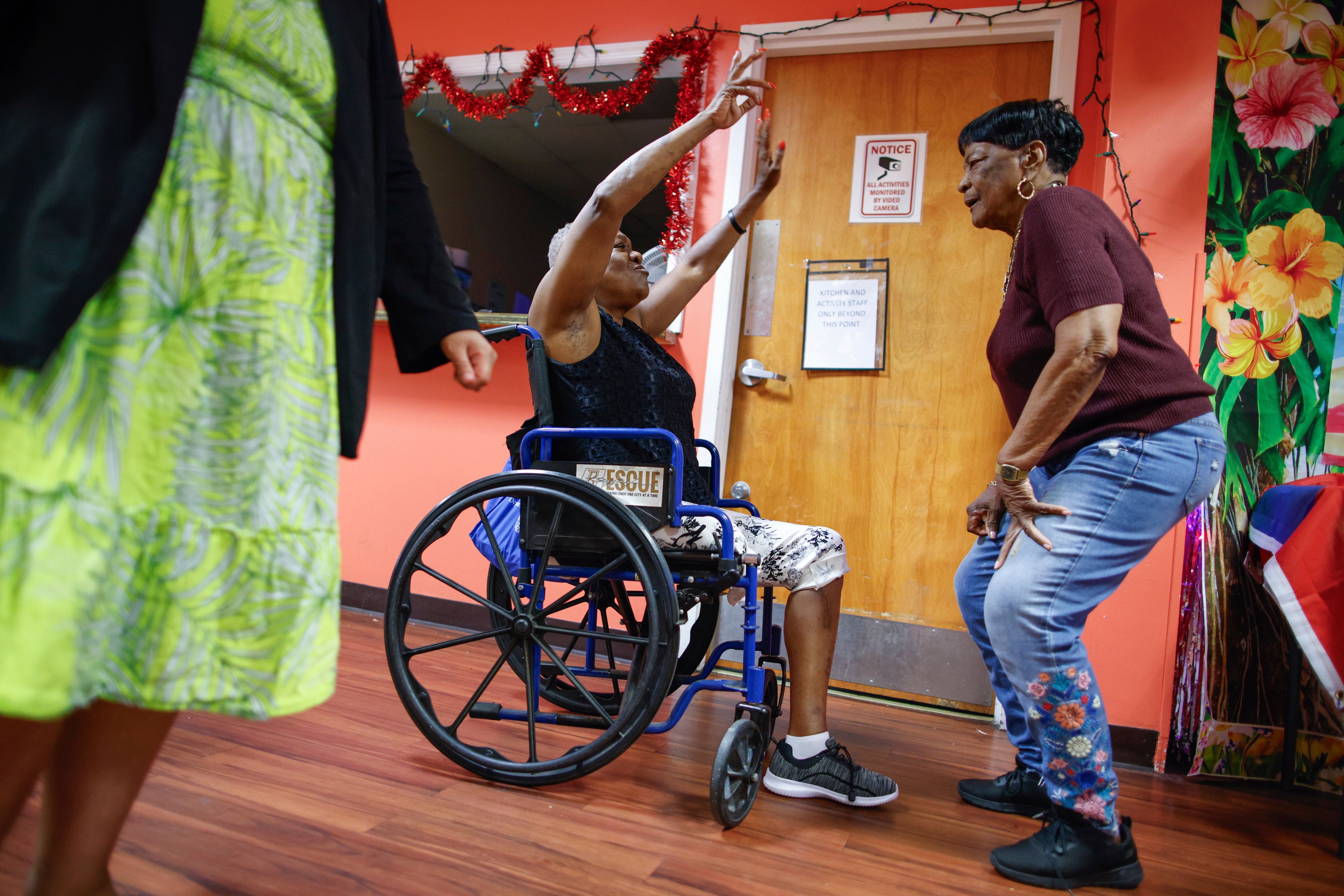 People attend a Zumba exercise class at Sunshine Adult Day Center in Bergenfield, N.J., Monday, Aug. 26, 2024. (AP Photo/Kena Betancur)