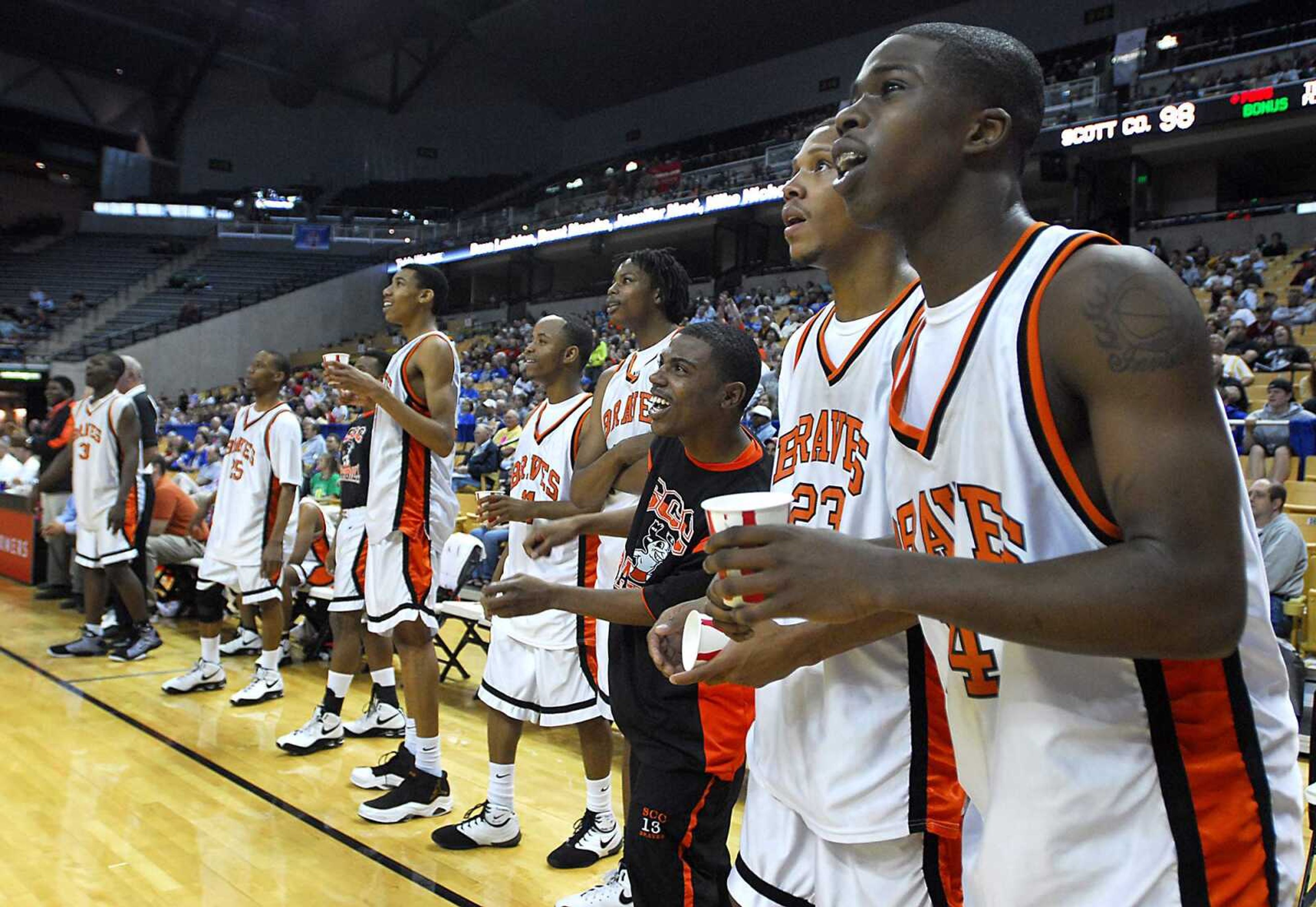 KIT DOYLE ~ kdoyle@semissourian.com
Braves starters Bobby Hatchett, right, and Drew Thomas cheer on their teammates in the final minutes of their Class 1 state championship win Saturday, March 21, 2009, at Mizzou Arena in Columbia.  The two led the Braves with 29 points each.