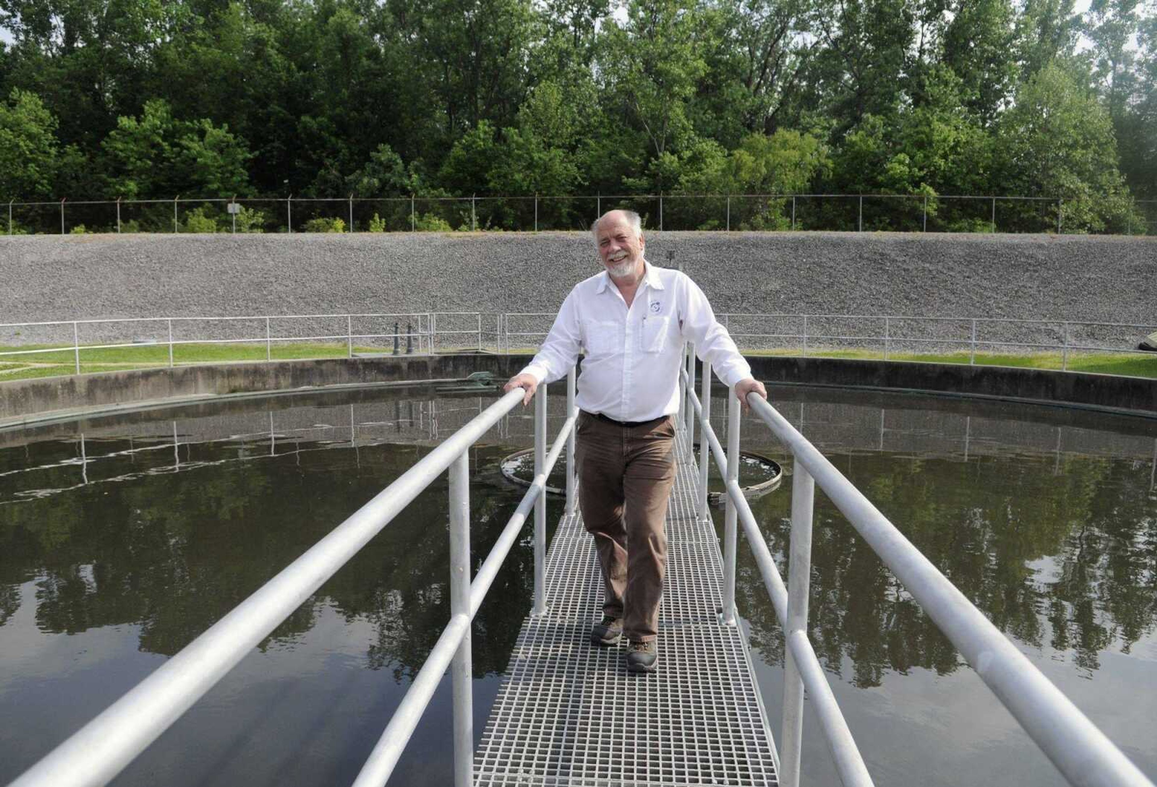 Wastewater Treatment Coordinator Dennis Hale stands near the secondary filtering tanks at the Cape Girardeau Wastewater Plant on Friday, April 30, 2010. (Kristin Eberts)