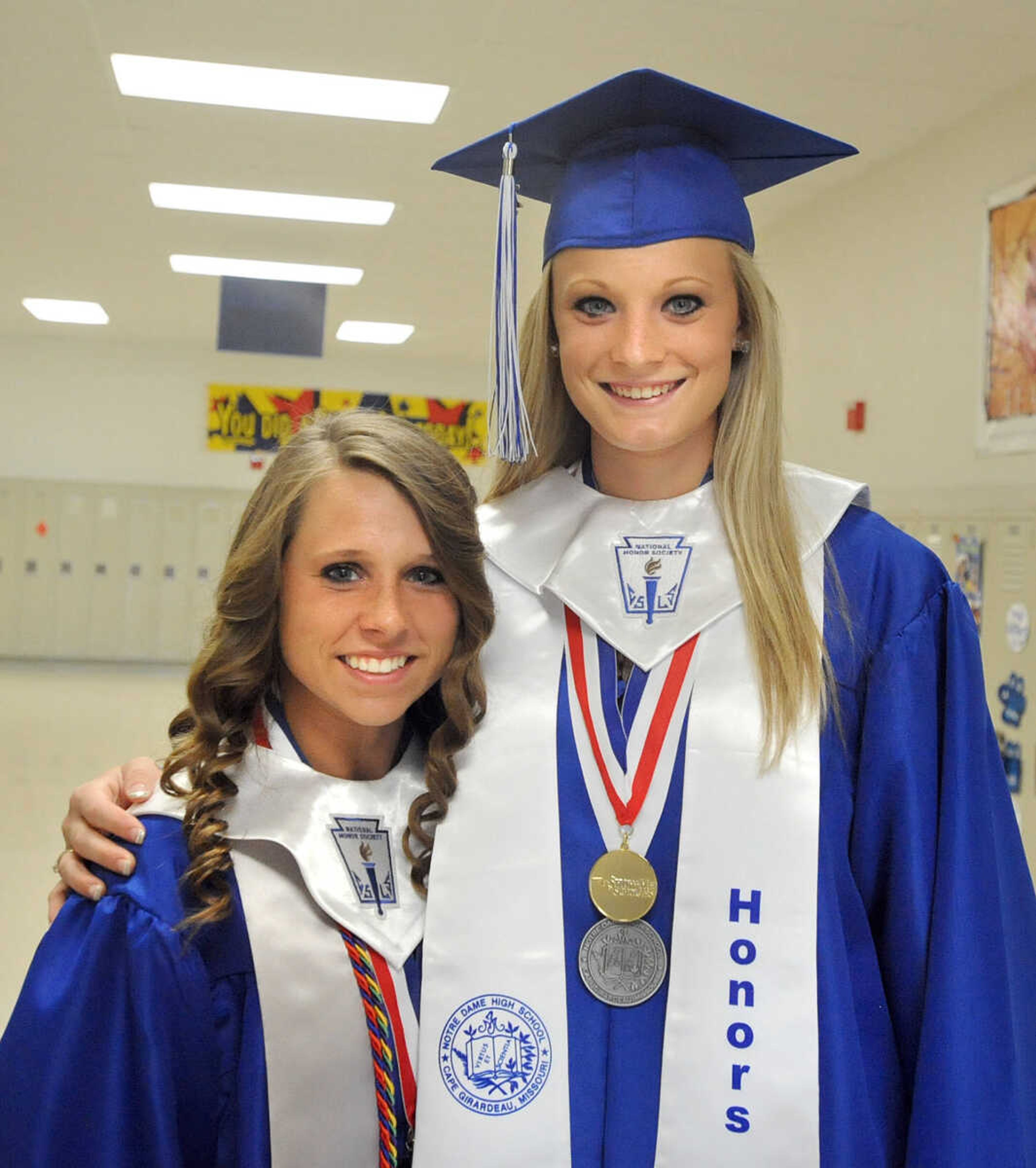 LAURA SIMON ~ lsimon@semissourian.com

Notre Dame Regional High School graduates Olivia Renner, left, and Miranda Fowler pose for a photo, Sunday, May 19, 2013.