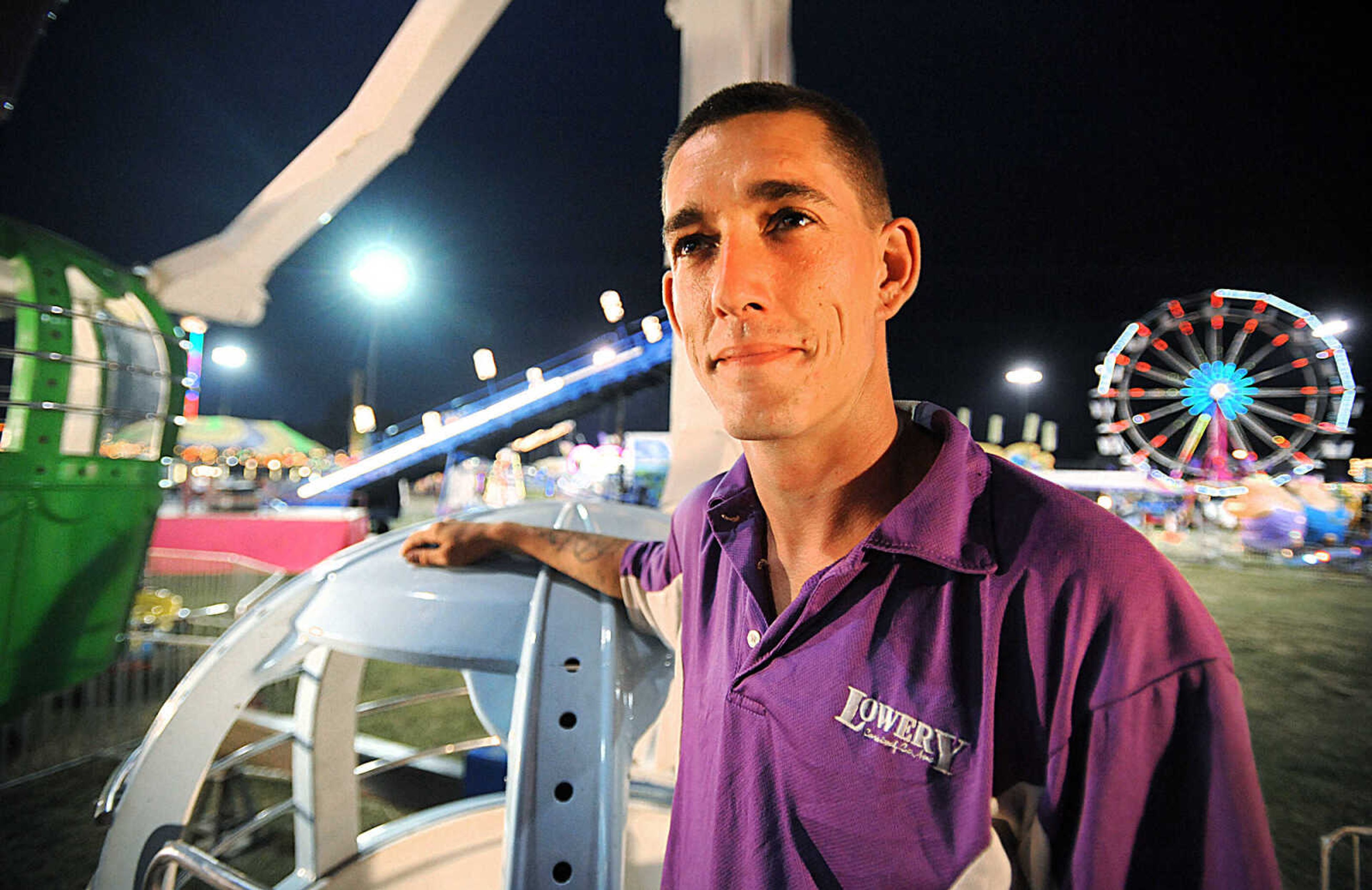 LAURA SIMON ~ lsimon@semissourian.com

Bryan Pellegrin waits for people to load onto the children's ferris wheel during the SEMO District Fair, Wednesday, Sept. 10, 2014.