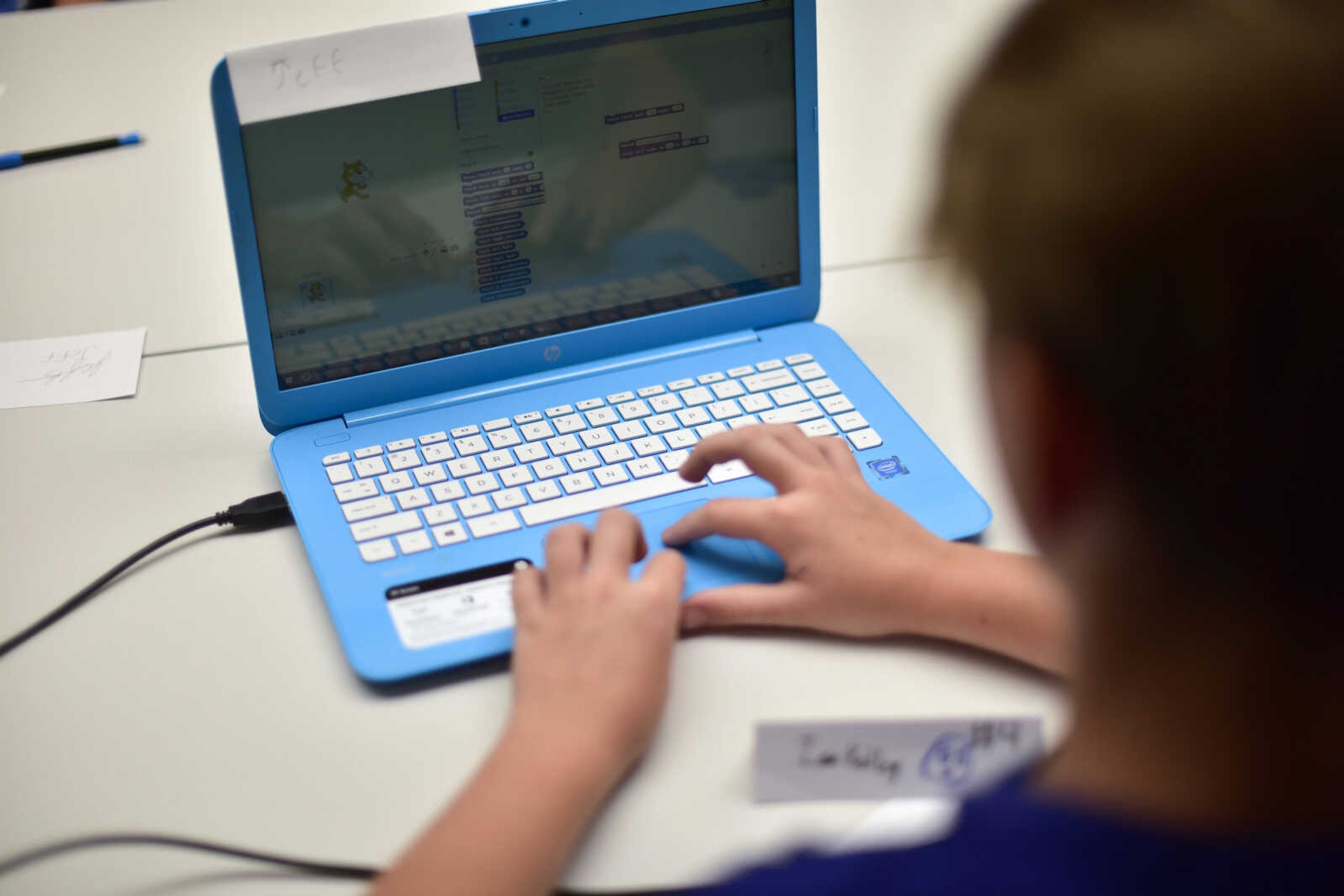 Ian Kelley writes commands for his robot during the Code Camp: Coding with The Finch with the Marquette Technology Institute Monday, July 17, 2017 in Cape Girardeau.