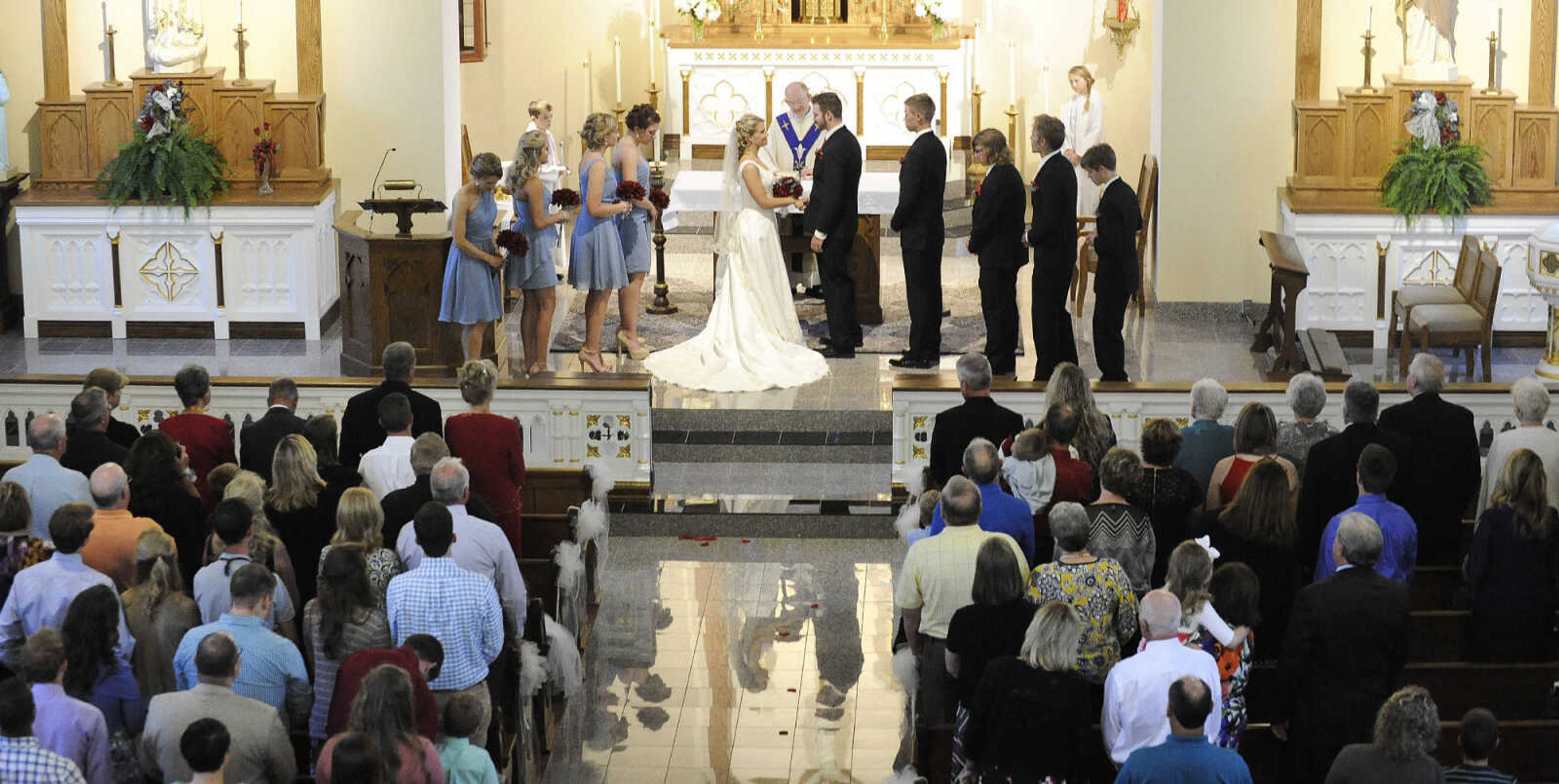 LAURA SIMON ~ lsimon@semissourian.com

The first wedding inside the newly remodeled St. John's Catholic Church in Leopold, Missouri, took place on Saturday, May 21, 2016.