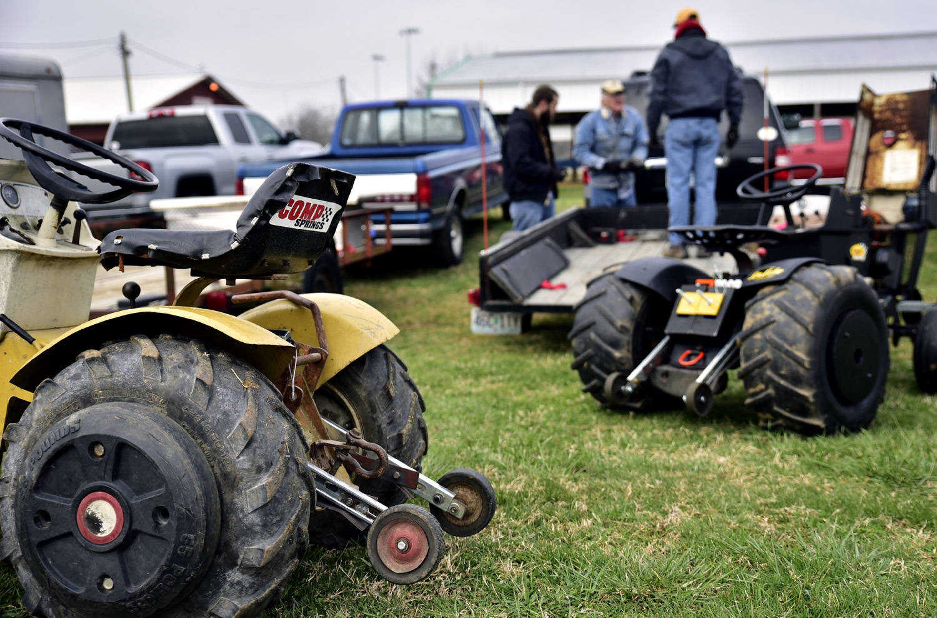 Tractors of the Eudy family sit as they prepare their tractors for the weigh-in for their pull at the Cousin Carl Farm Show on Saturday, March 10, 2018, at Arena Park in Cape Girardeau.