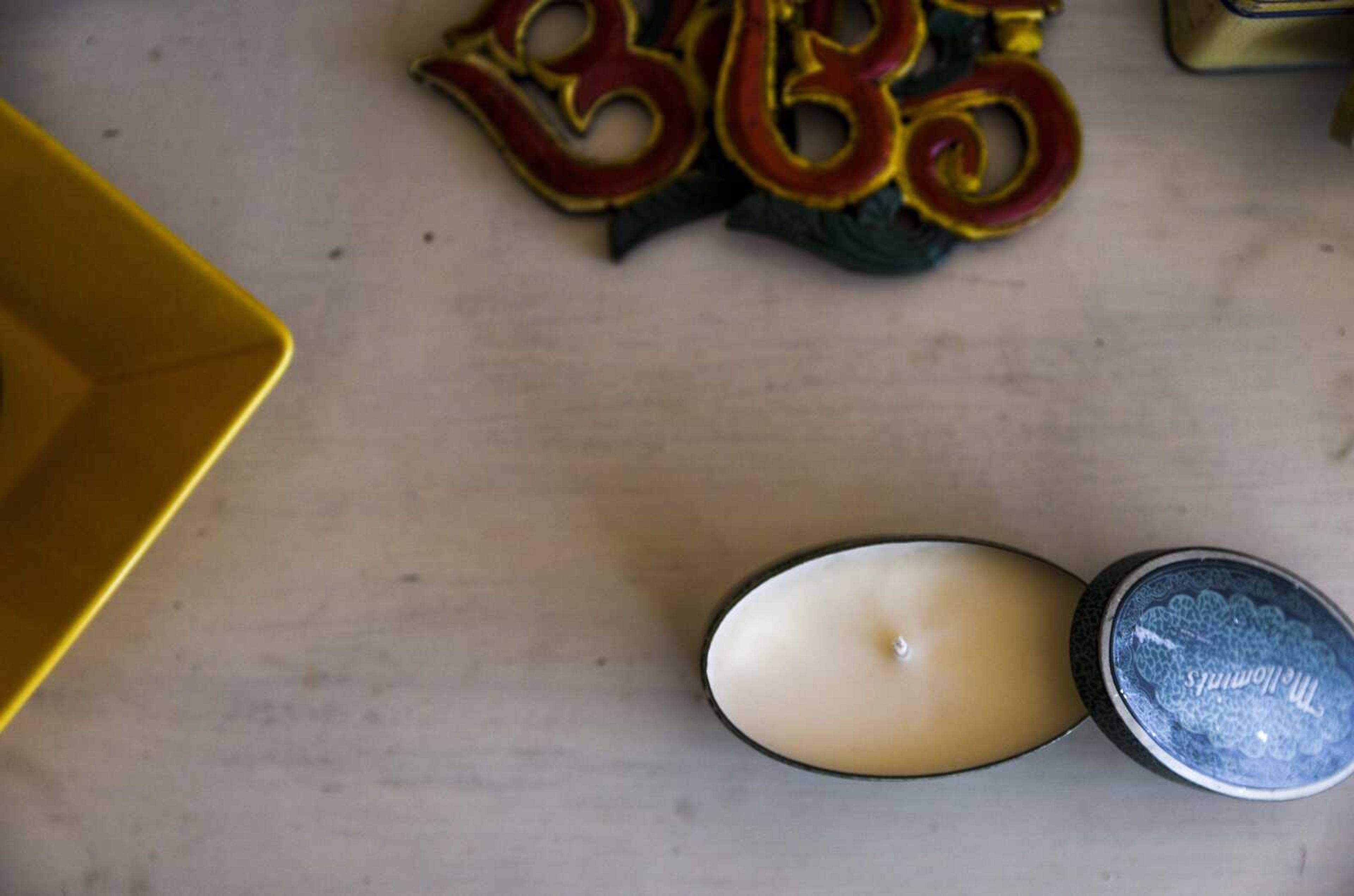 Candles are seen July 2 in the front room of Yoga East in Cape Girardeau.