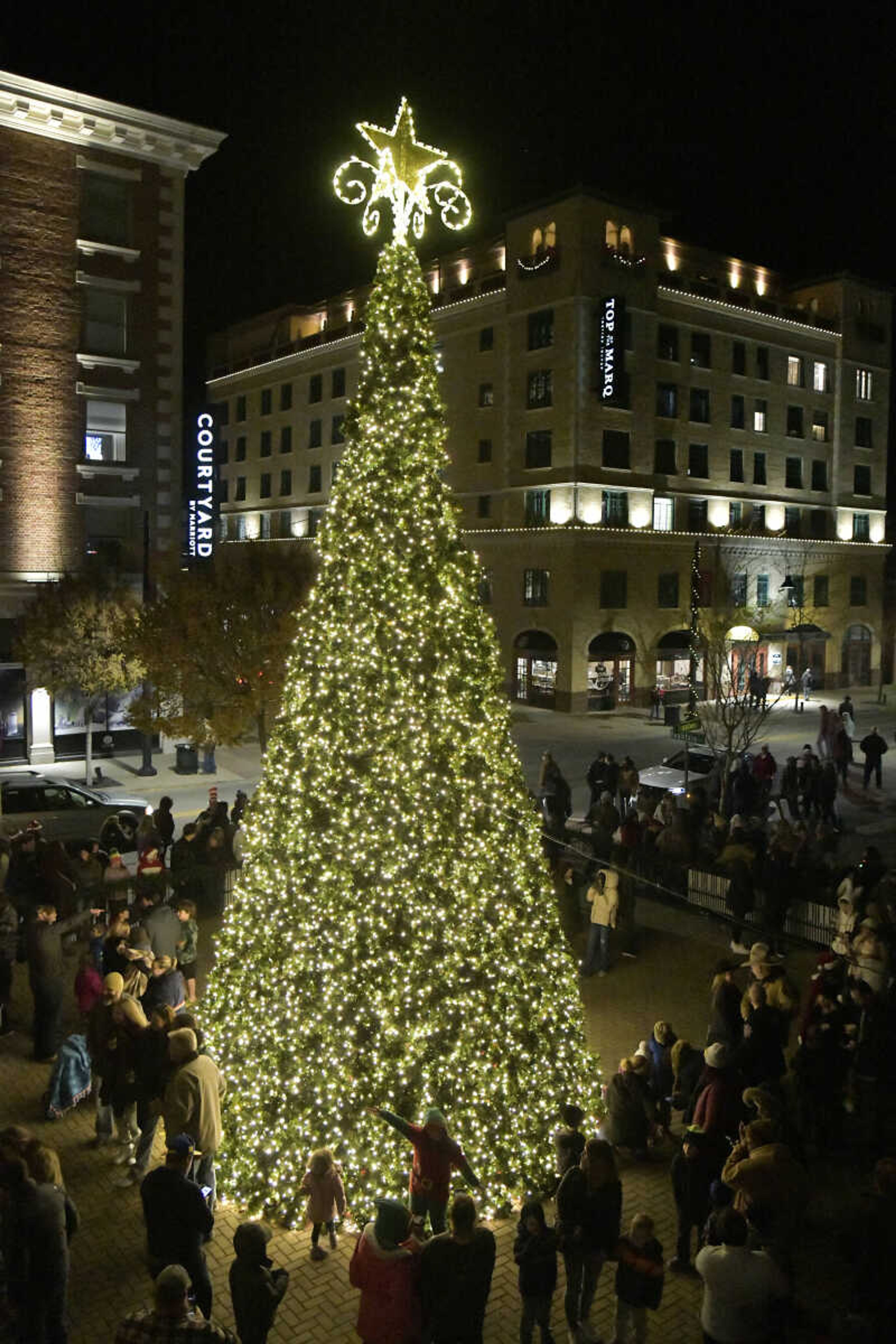 The crowd gathers around the tree during the 3rd Annual Old Town Cape Christmas Tree Lighting on Friday in Cape Girardeau.