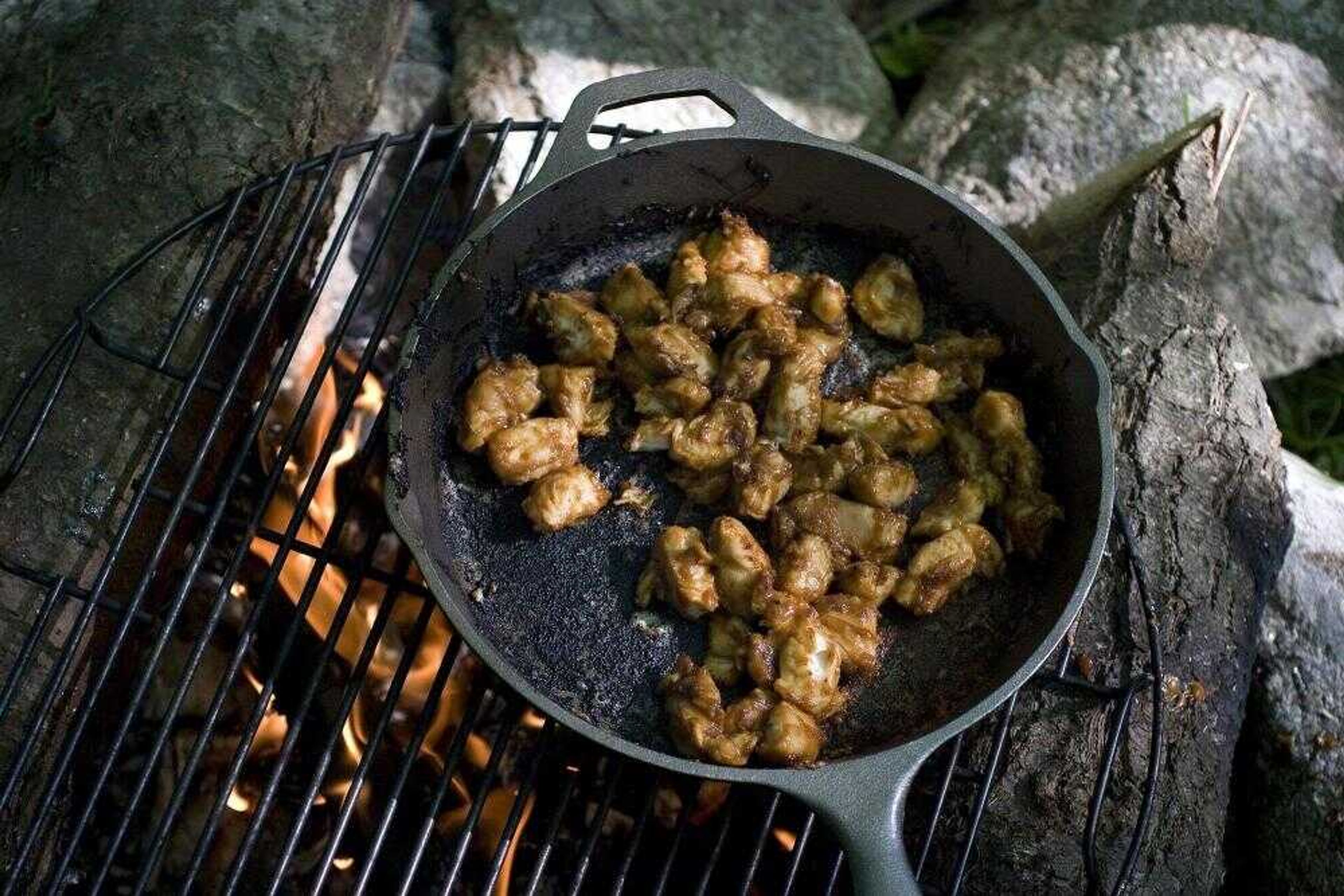 Sticky chicken, shown here, is an easy campfire meal. (Larry Crowe ~ Associated Press)