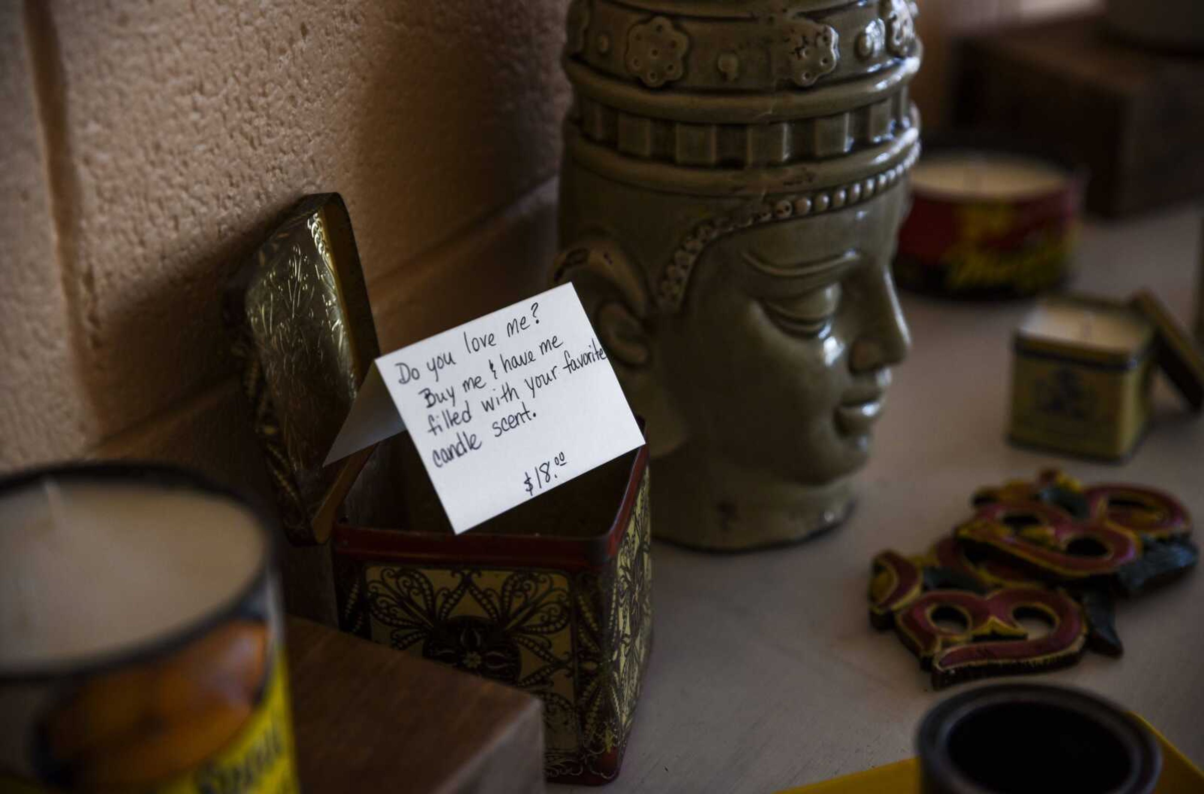 Candles are seen July 2 in the front room of Yoga East in Cape Girardeau.