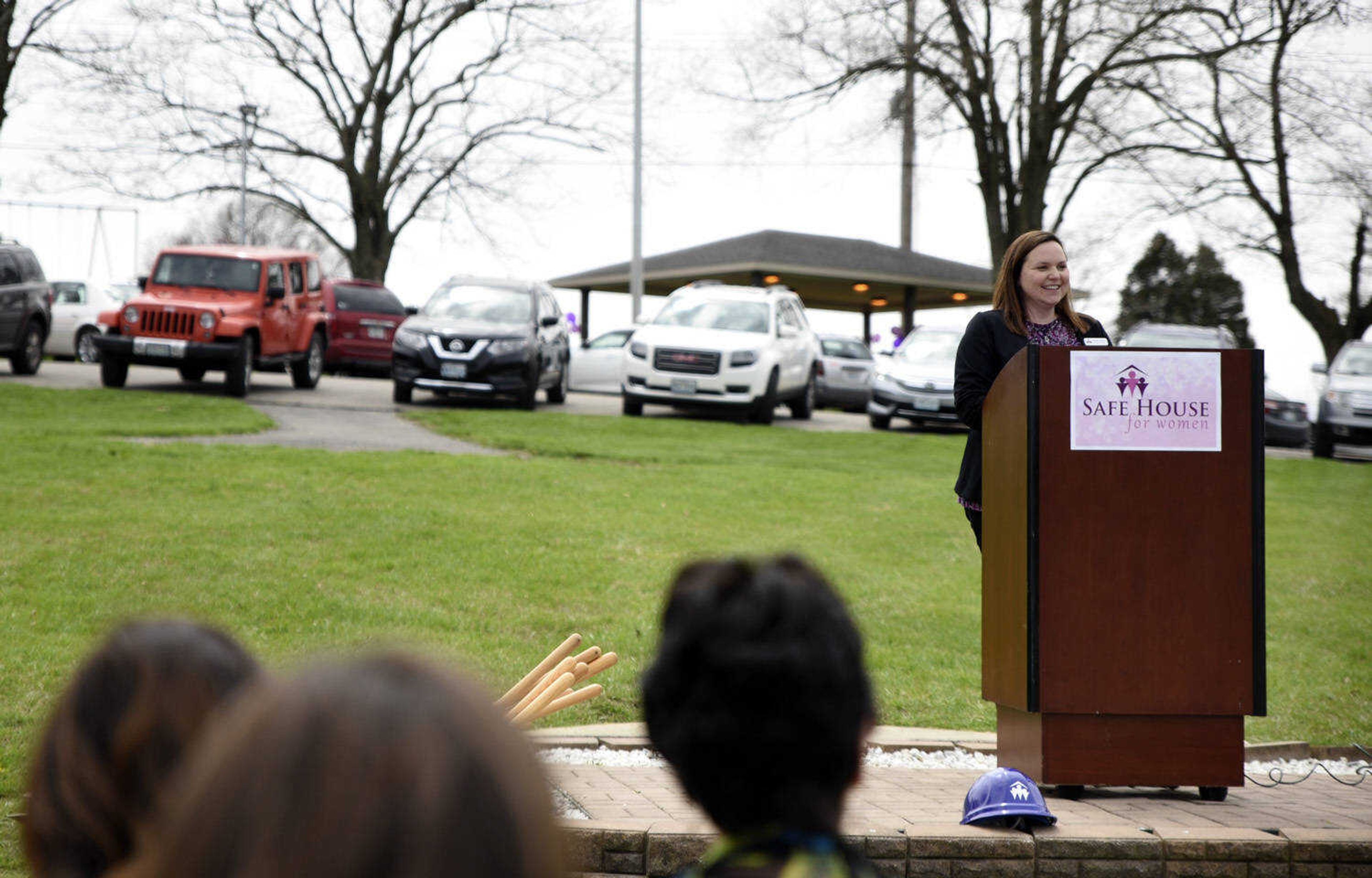 Jessica Hill welcomes community members to Cape County Park North for a symbolic ground-breaking ceremony for the new women's safe house on Friday, April 6, 2018, in Cape Girardeau.