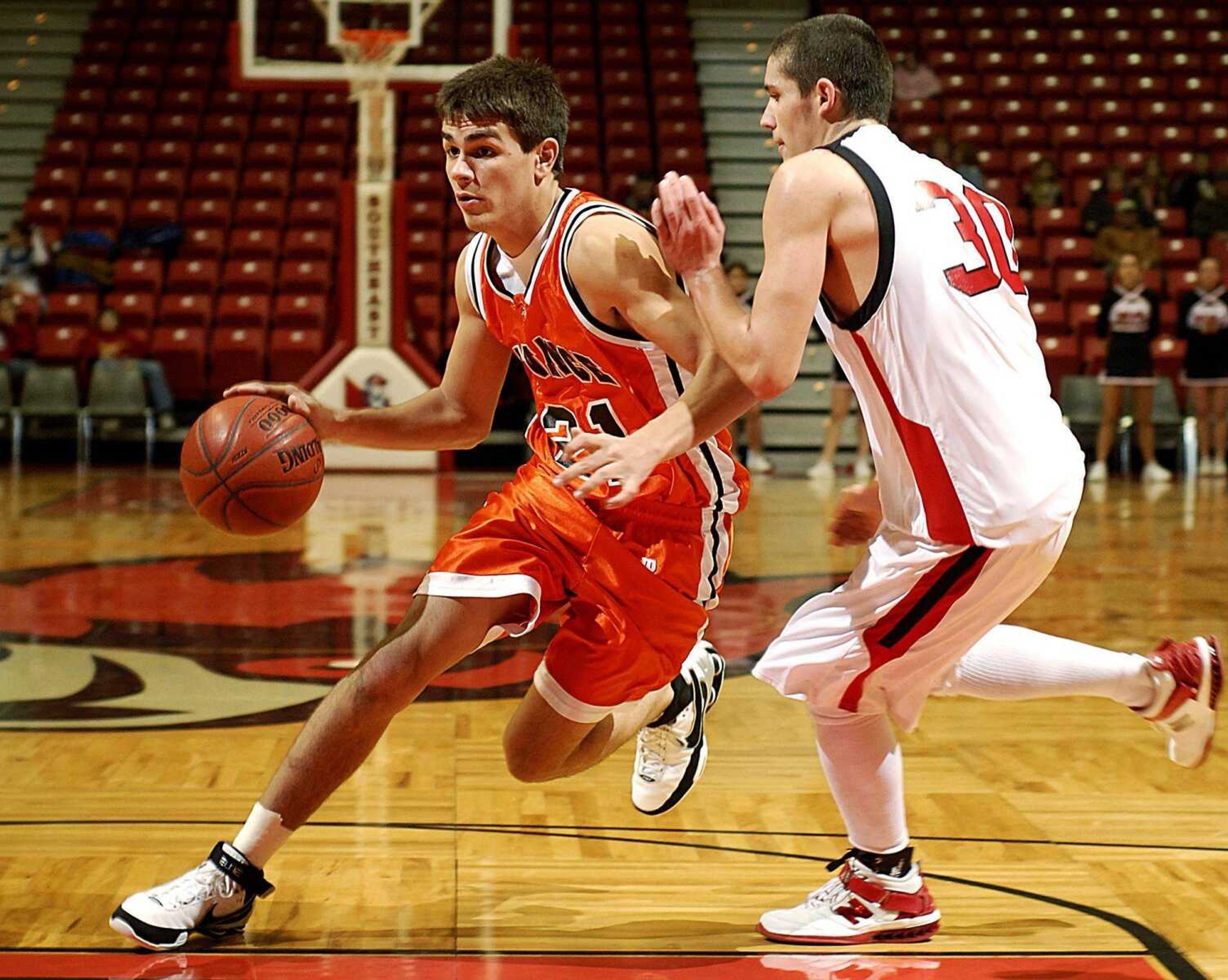 Advance's David VanGennip drove past Chaffee's Gabe Seabaugh during Thursday's consolation game. (Aaron Eisenhauer)