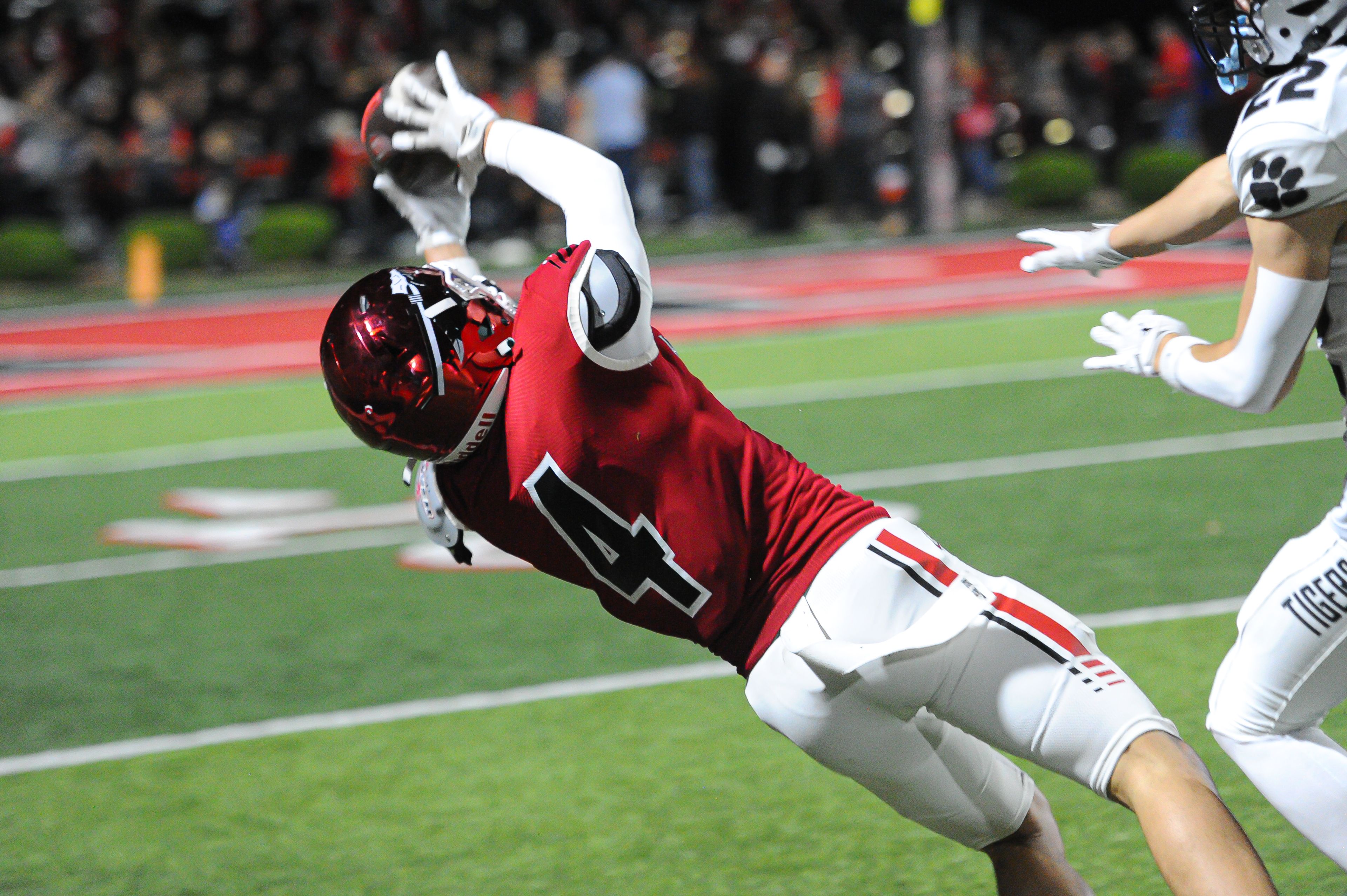 Jackson's Kai Crowe reels in a tough catch during a Friday, October 25, 2024 game between the Jackson Indians and the Festus Tigers at "The Pit" in Jackson, Mo. Jackson defeated Festus, 43-7.