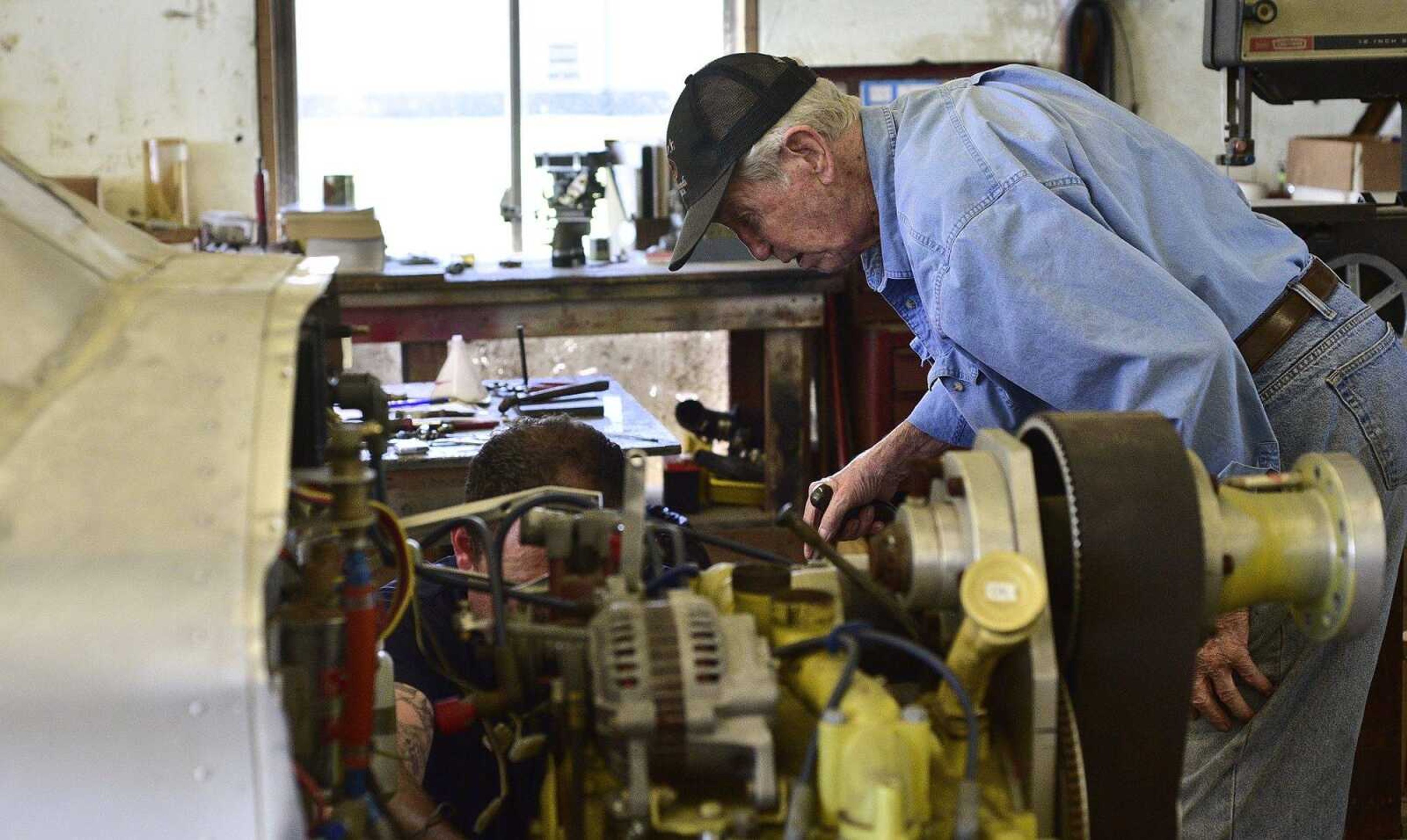 Cutline-Body Copy:John Farquhar, or known to most as "Papa John" spends most of his days tinkering inside the hangar that houses Cape Copters at the Cape Girardeau Regional Airport.