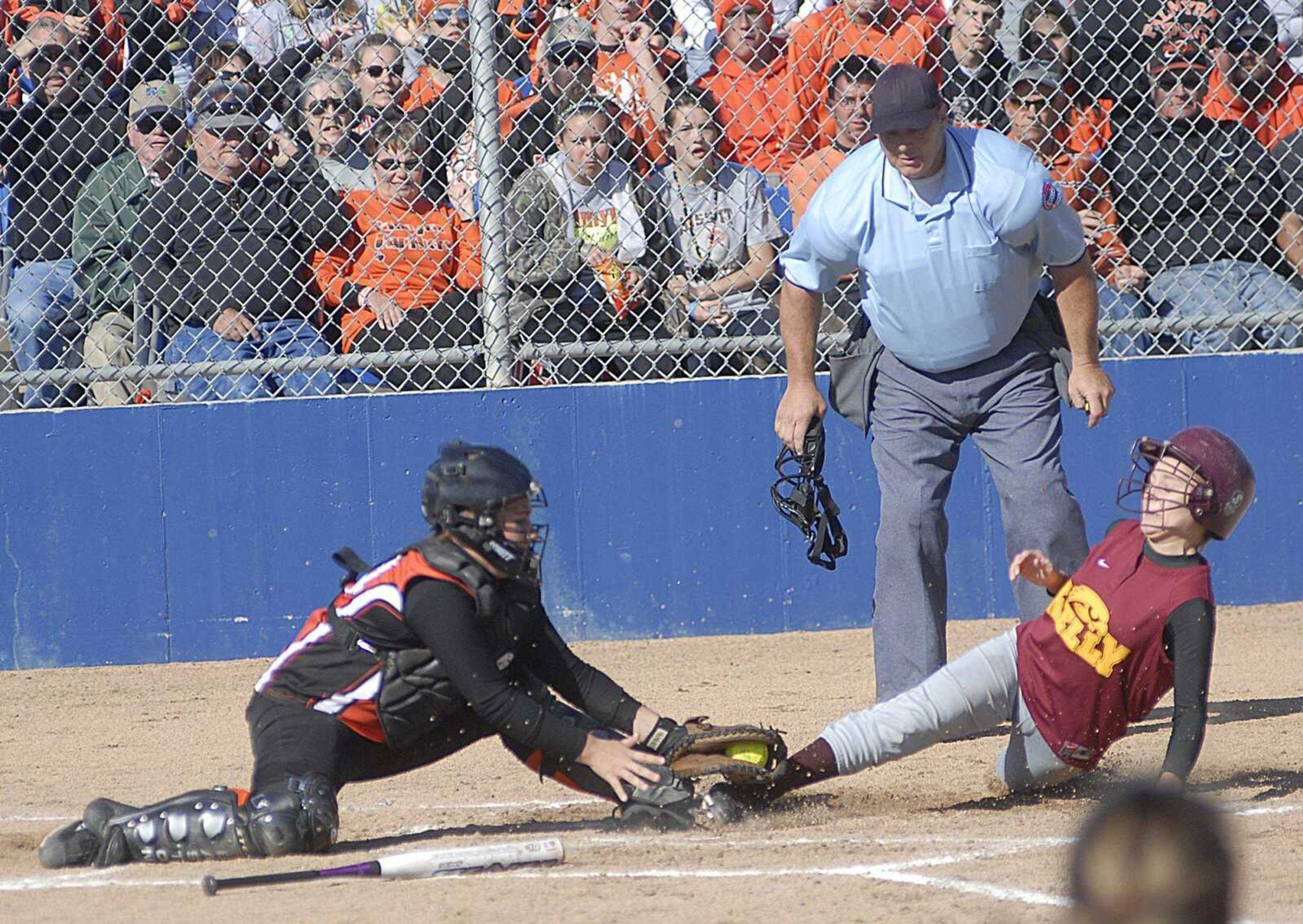 Kely baserunner Emily Grojean is tagged out at home by Palmyra's catcher during the fifth inning Saturday.