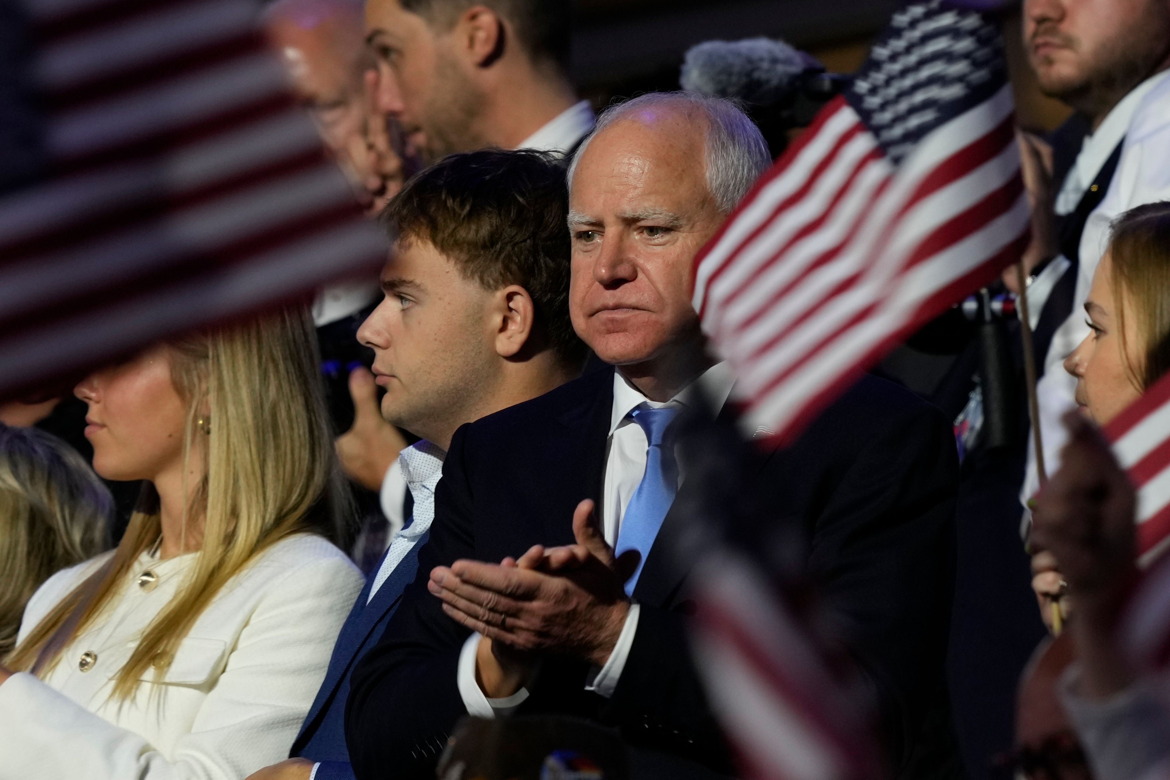 Democratic vice presidential nominee Minnesota Gov. Tim Walz claps during the Democratic National Convention Thursday, Aug. 22, 2024, in Chicago. (AP Photo/Matt Rourke)