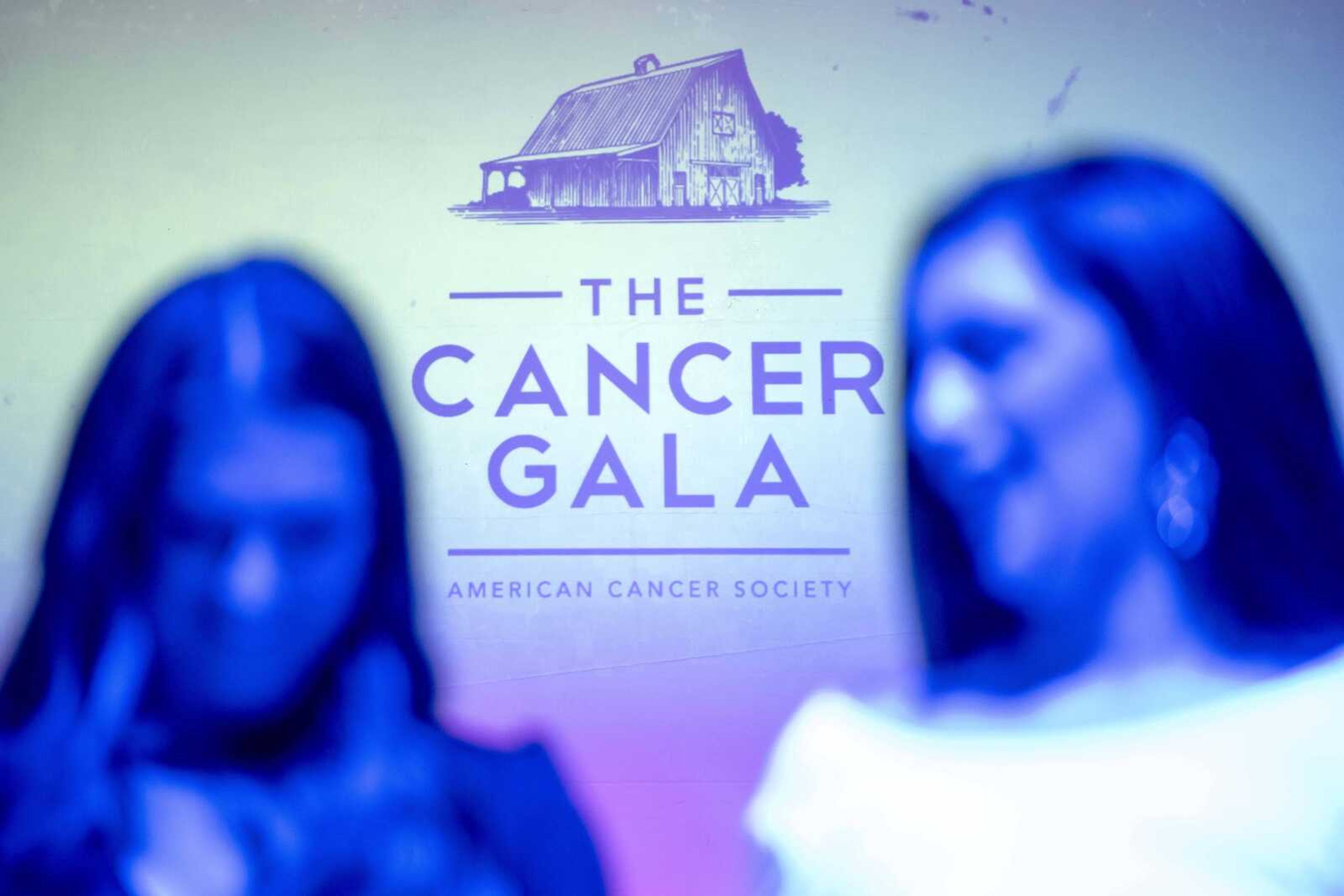 A projection is seen during a fundraising gala for the American Cancer Society at Rusted Route Farms Saturday, Nov. 16, 2019, in Cape Girardeau.